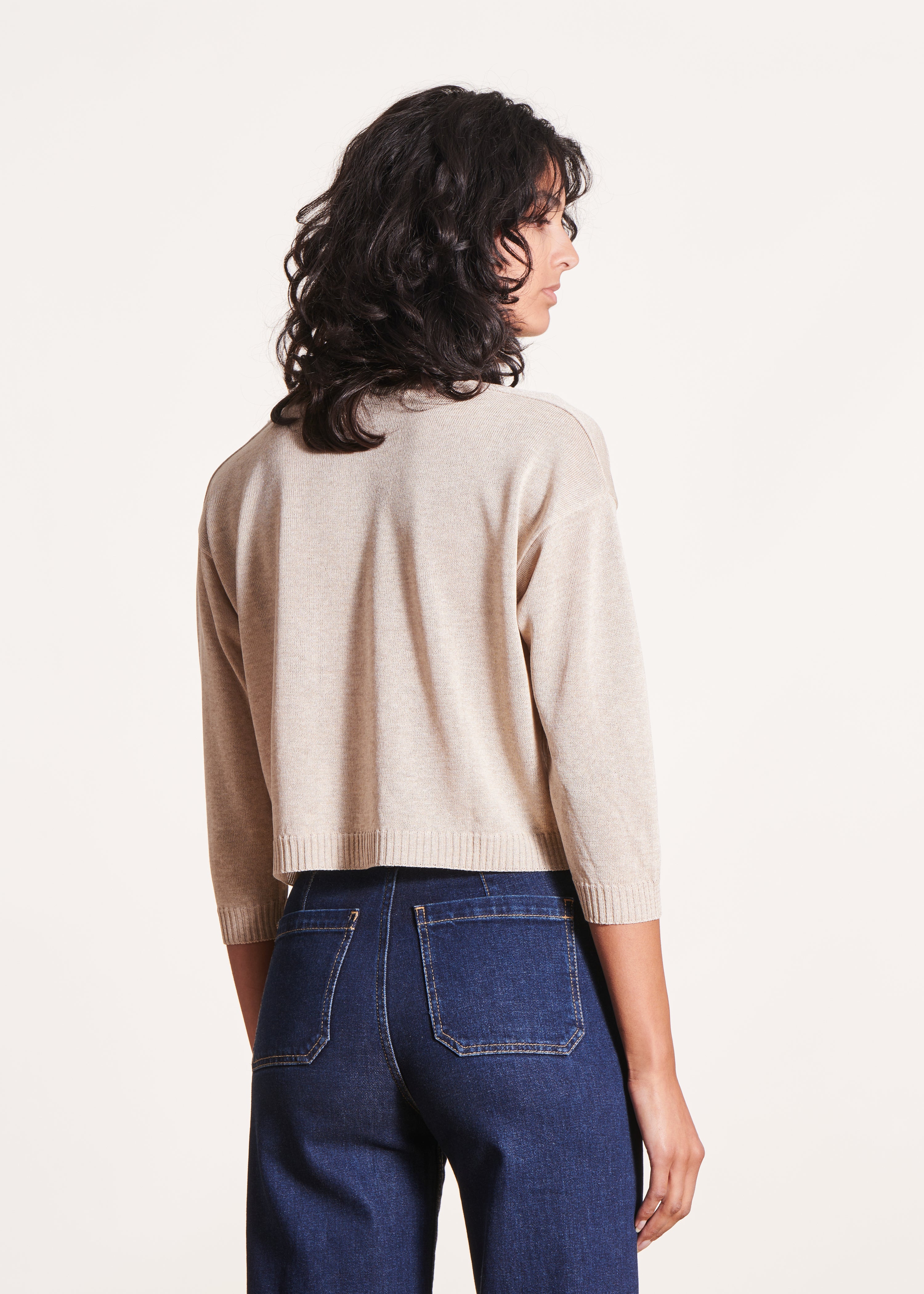 Kort beige vest, lange mouwen, V-hals
