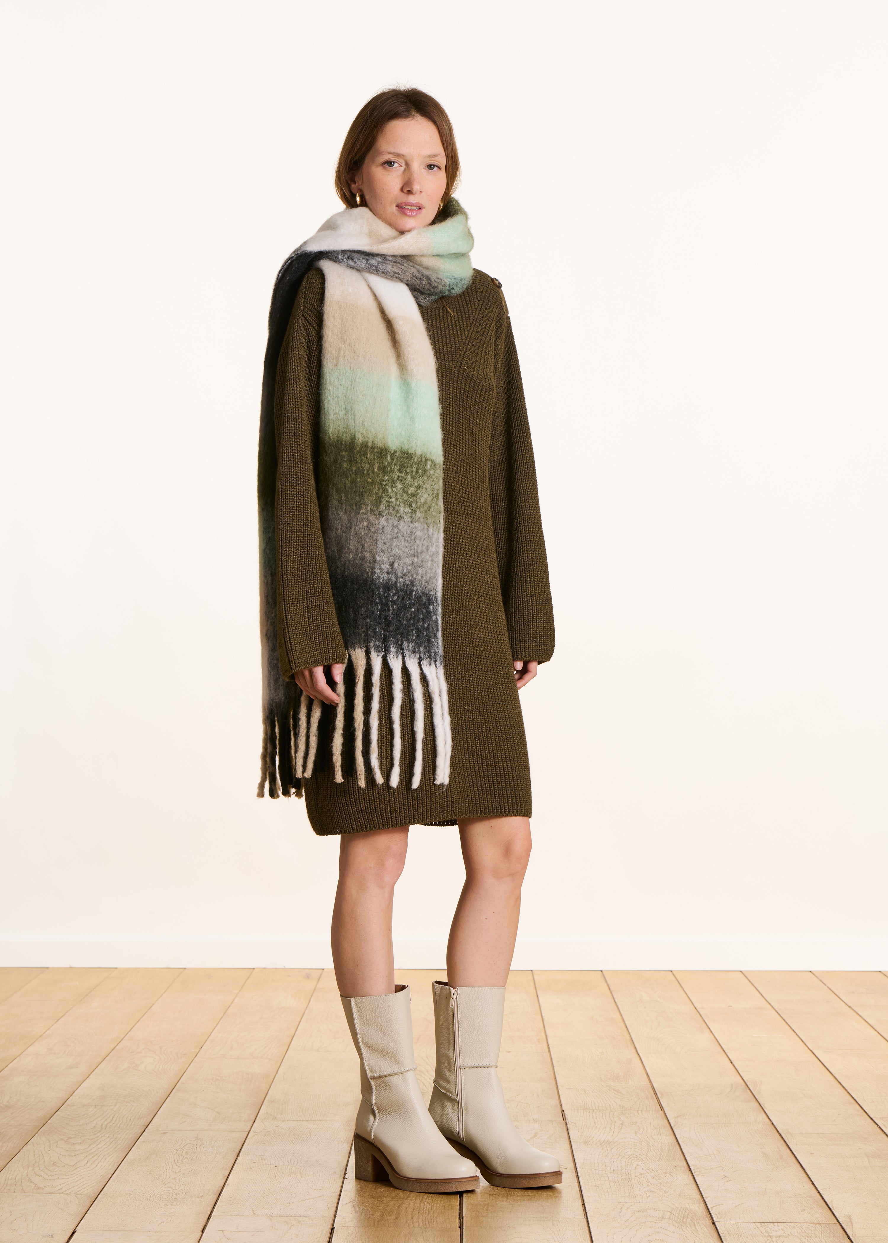 Mid-calf boots in off-white leather
