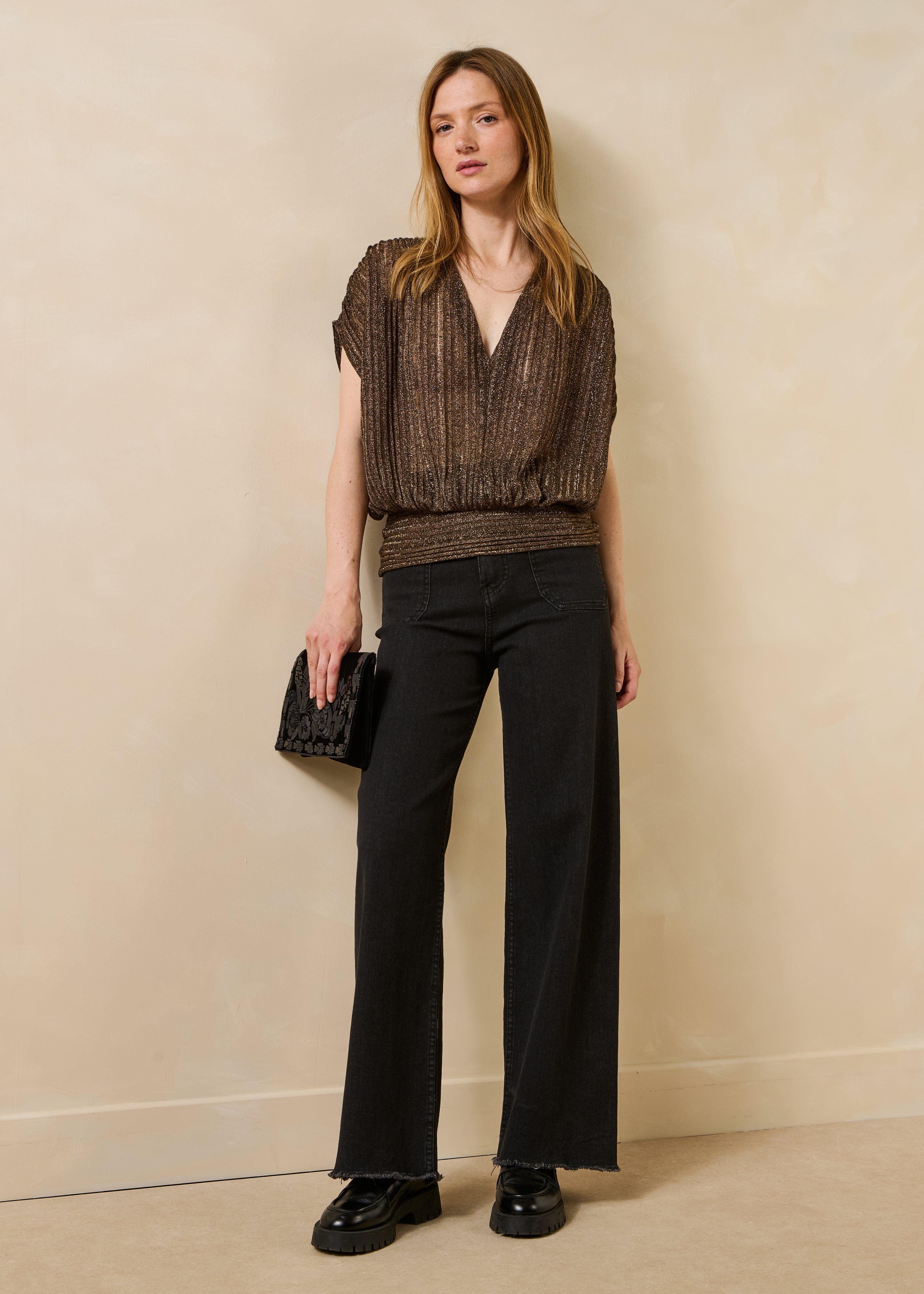 Black high-waisted flare jeans in organic cotton