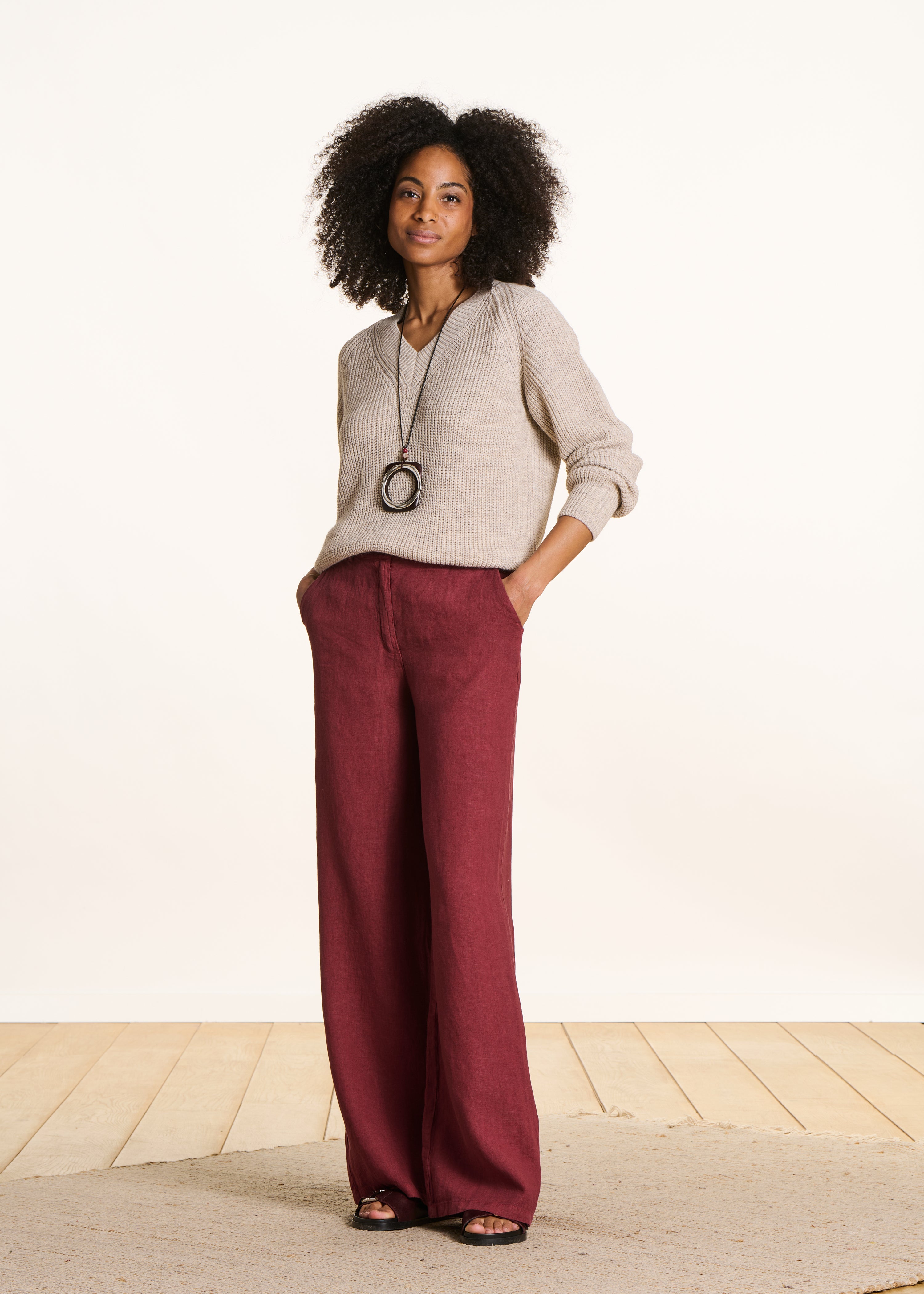 Beige V-neck sweater in beaded rib knit