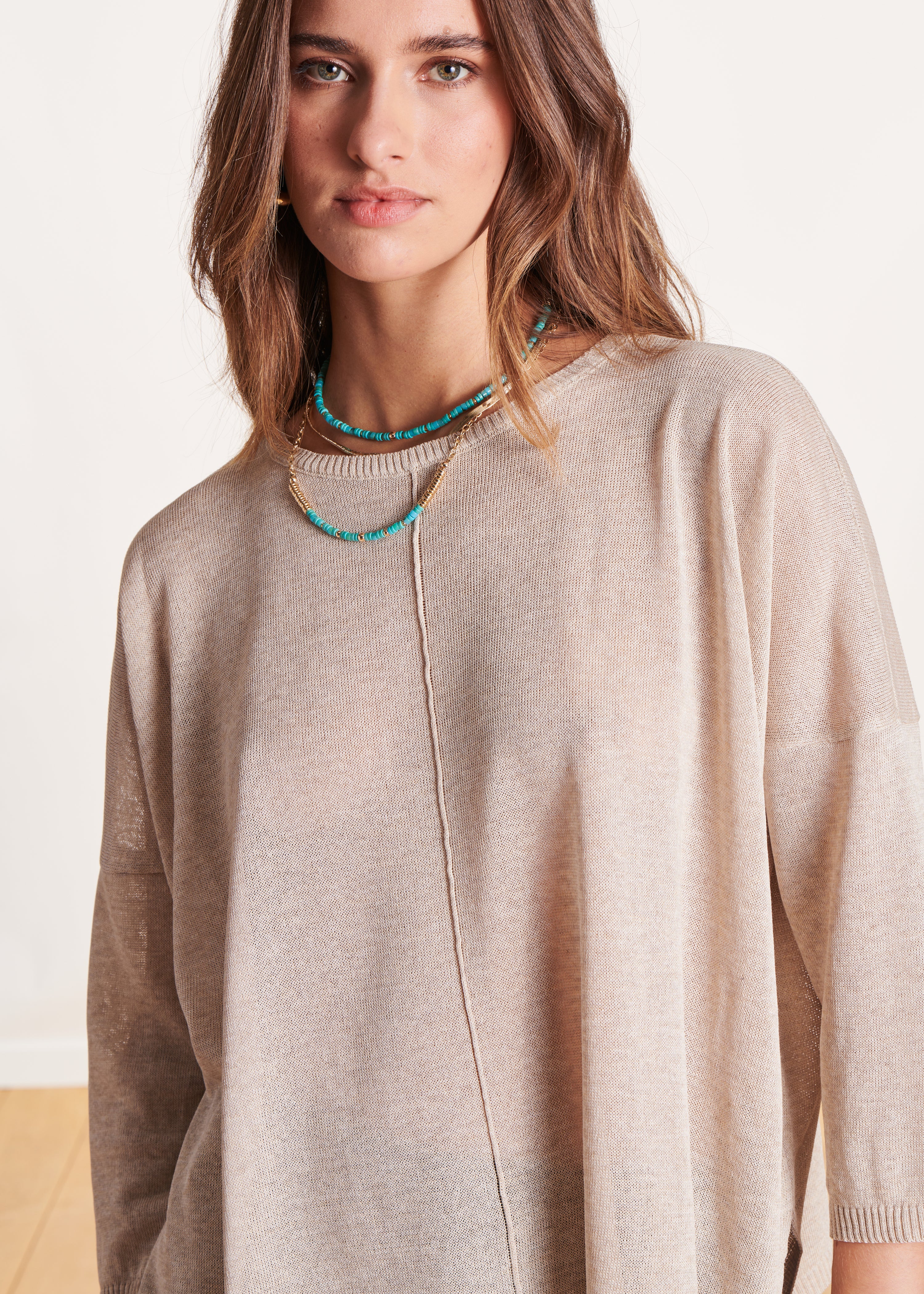 Pull doré manches 3/4 oversize