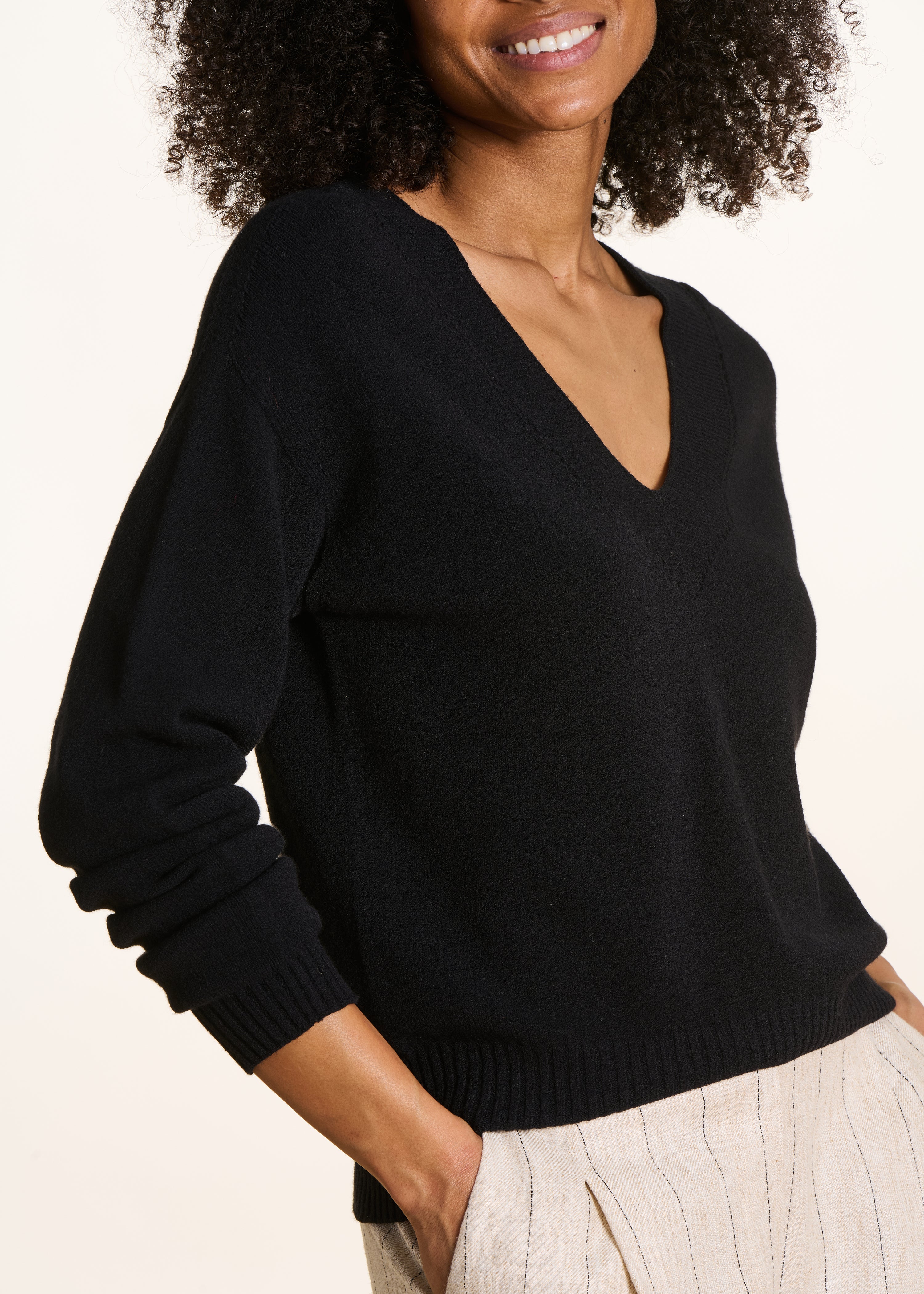 Straight black V-neck jumper