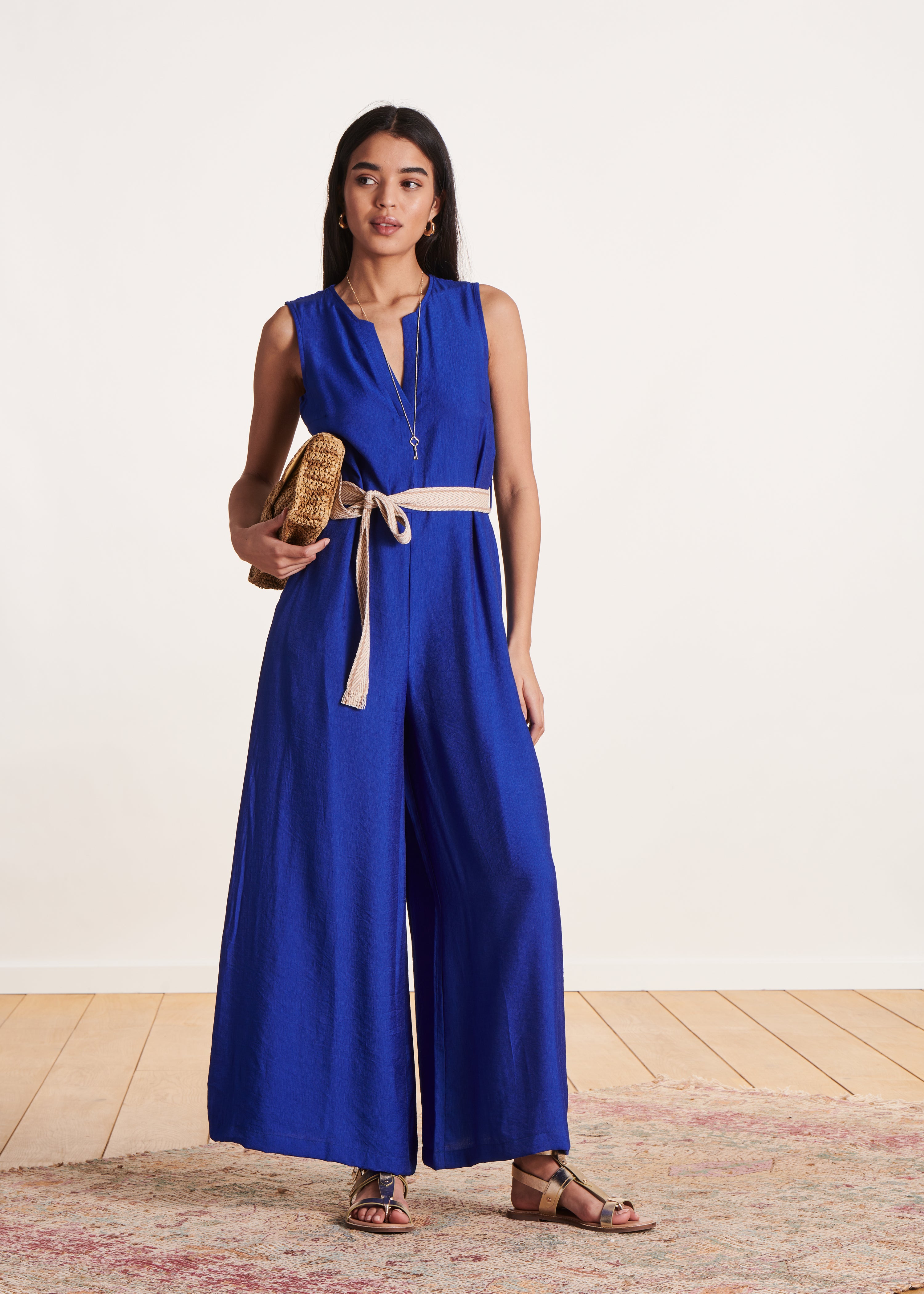Mono azul real sin mangas fluido en jacquard