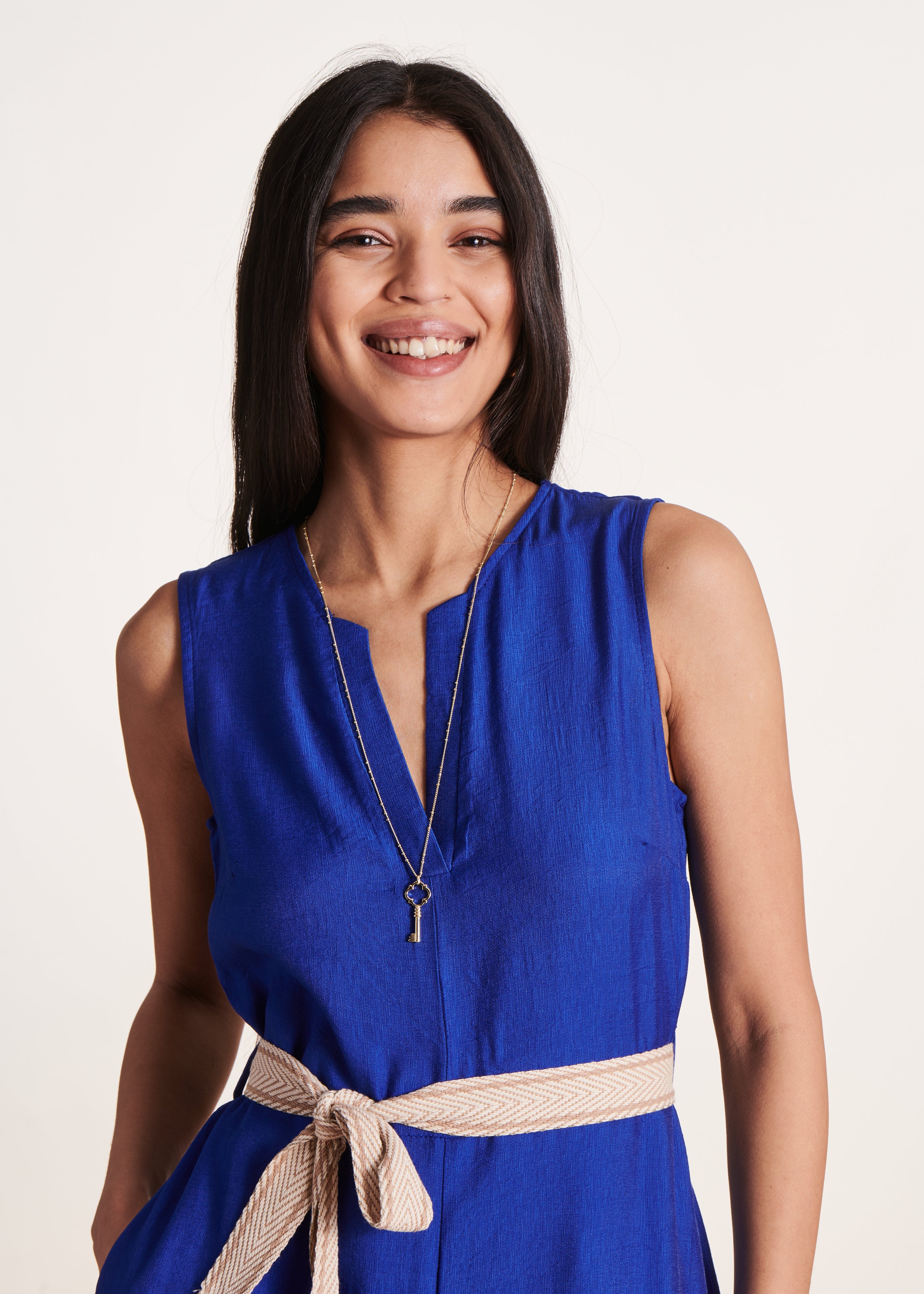 Mono azul real sin mangas fluido en jacquard