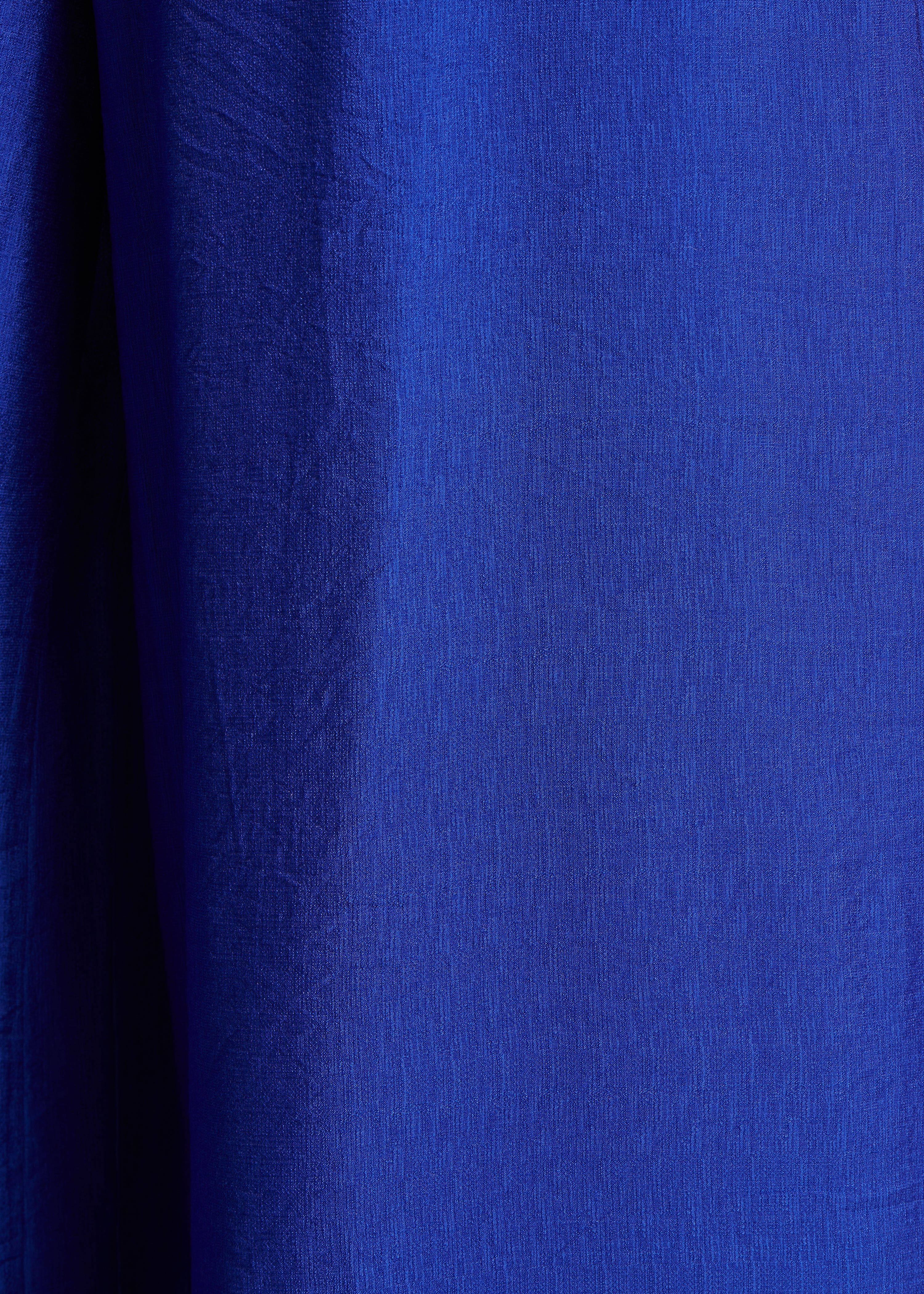 Mono azul real sin mangas fluido en jacquard
