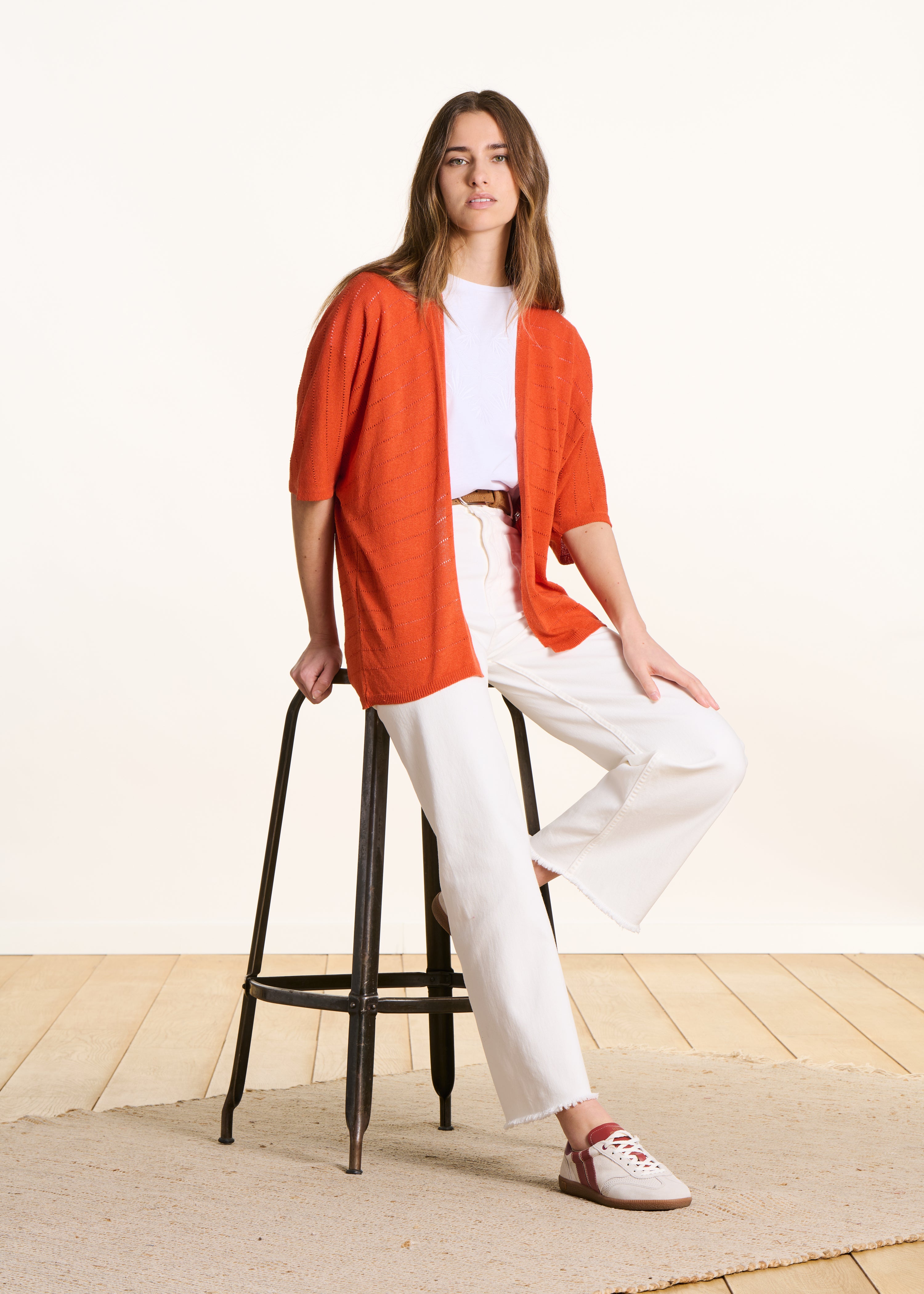 Lightweight openwork orange vest with short sleeves