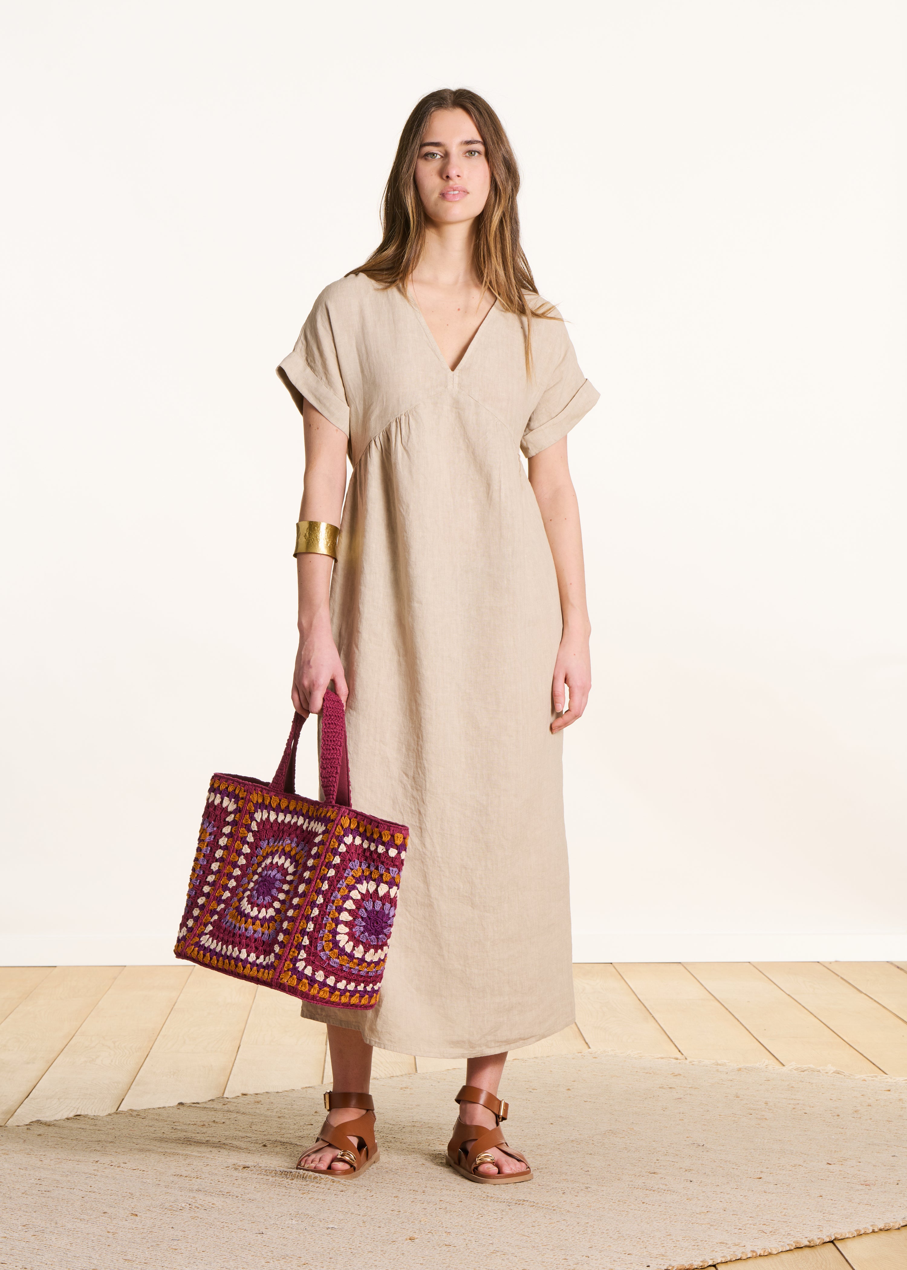 Loose long beige linen dress with short sleeves
