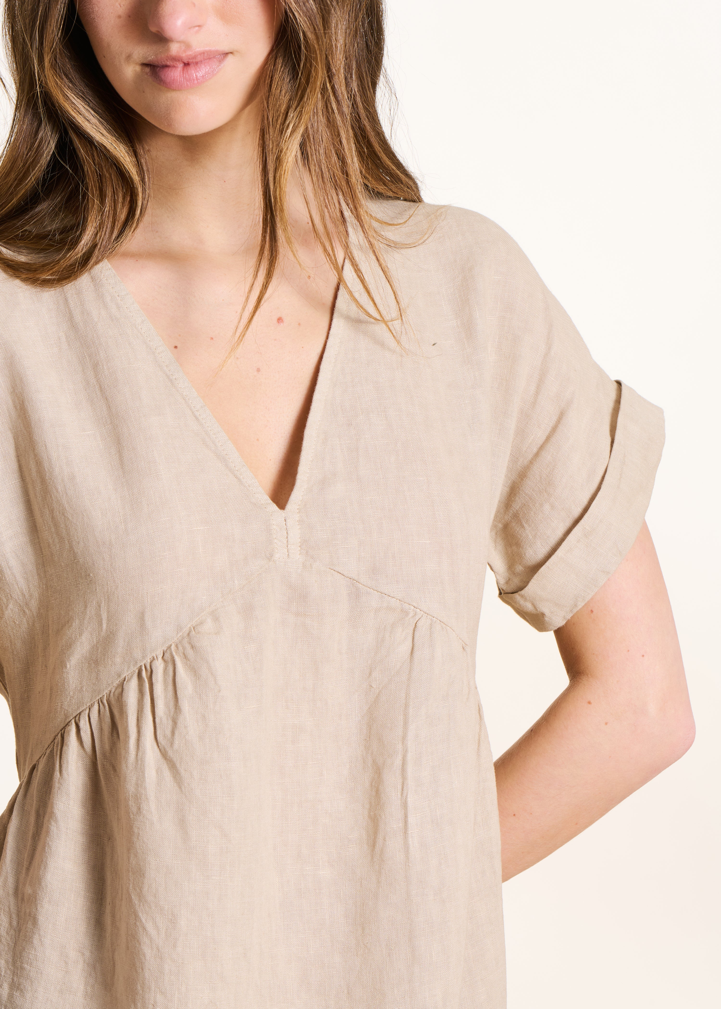 Loose long beige linen dress with short sleeves