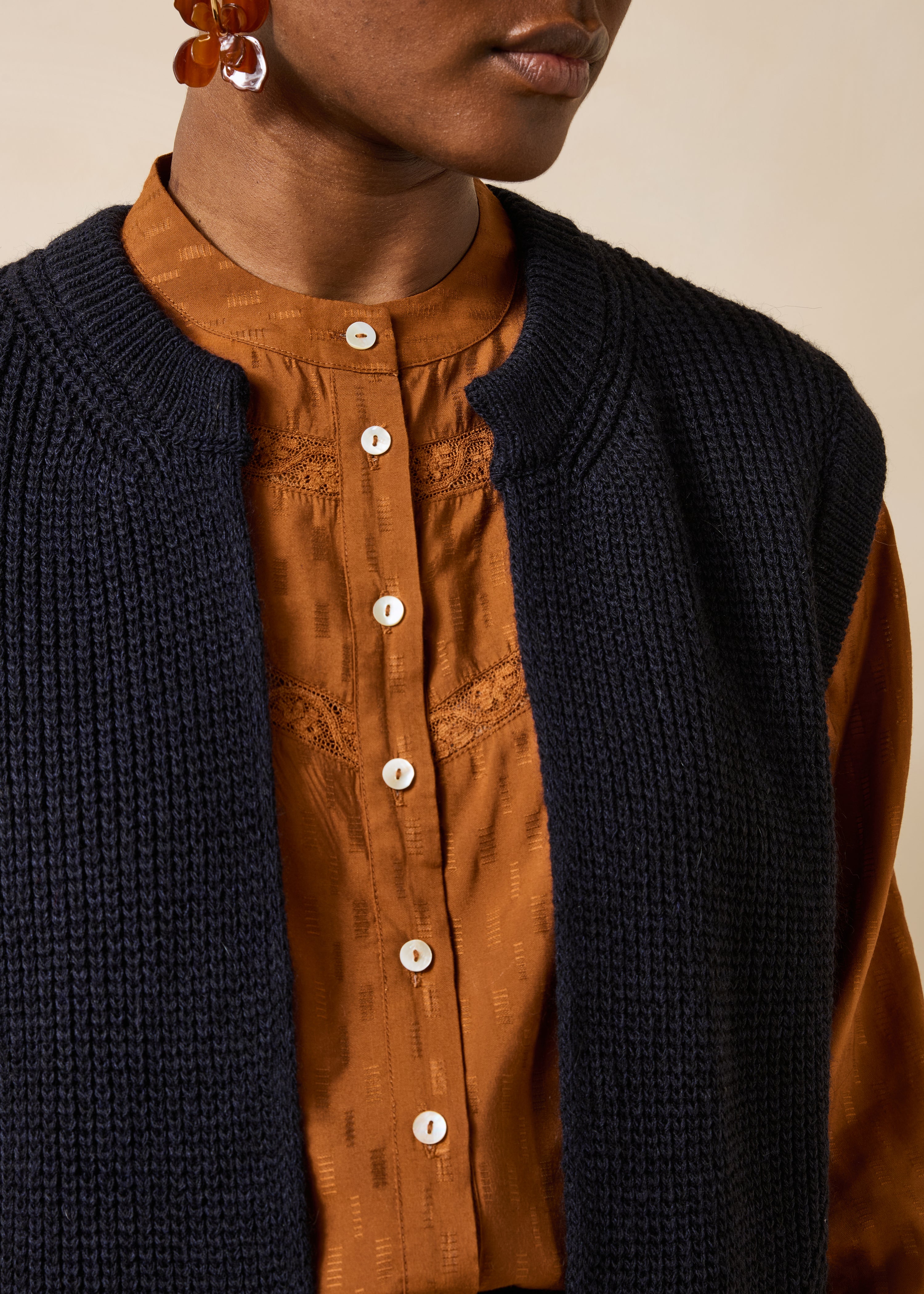 Short sleeveless navy blue beaded rib cardigan