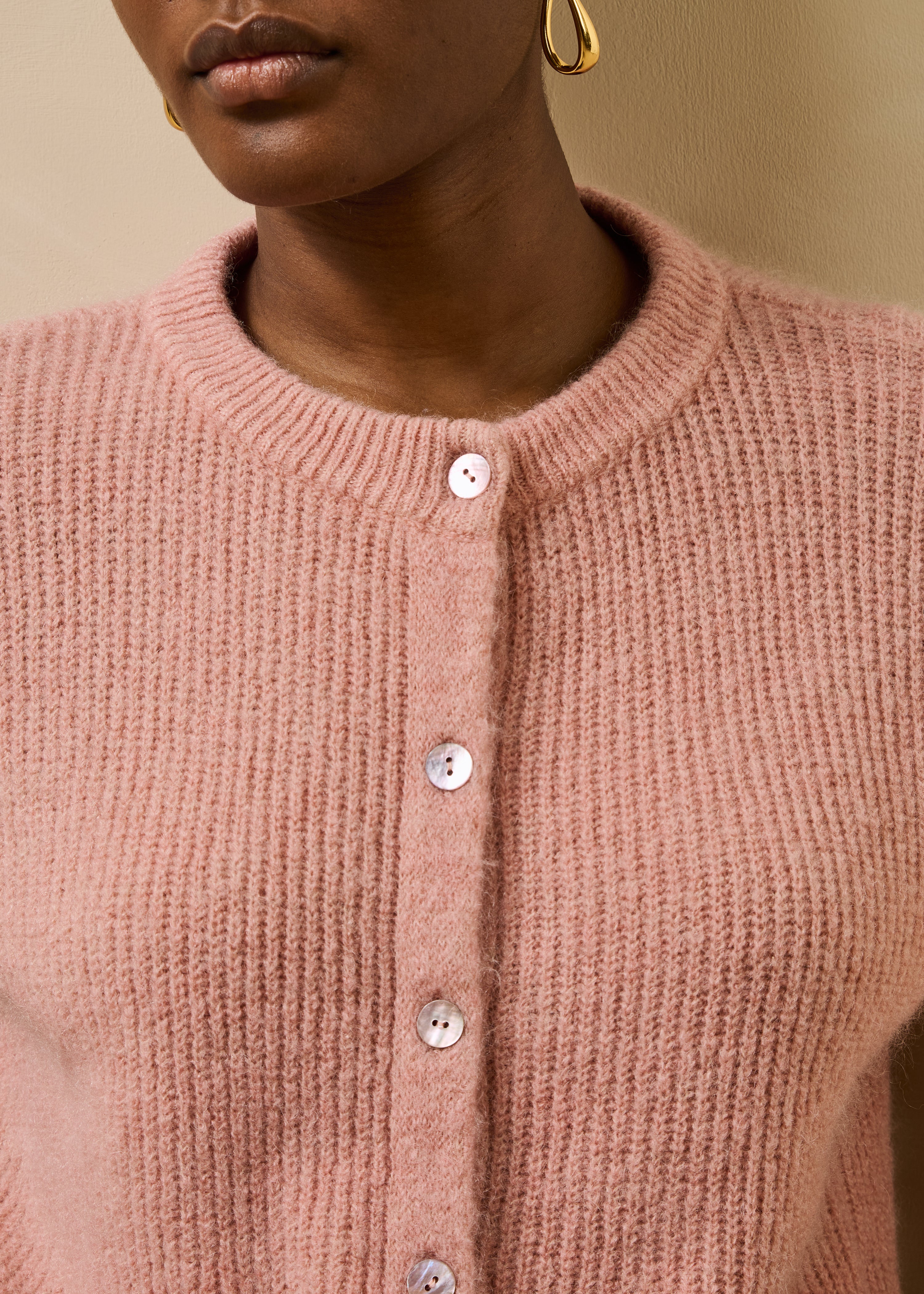 Gilet rosa pallido maniche lunghe collo tondo