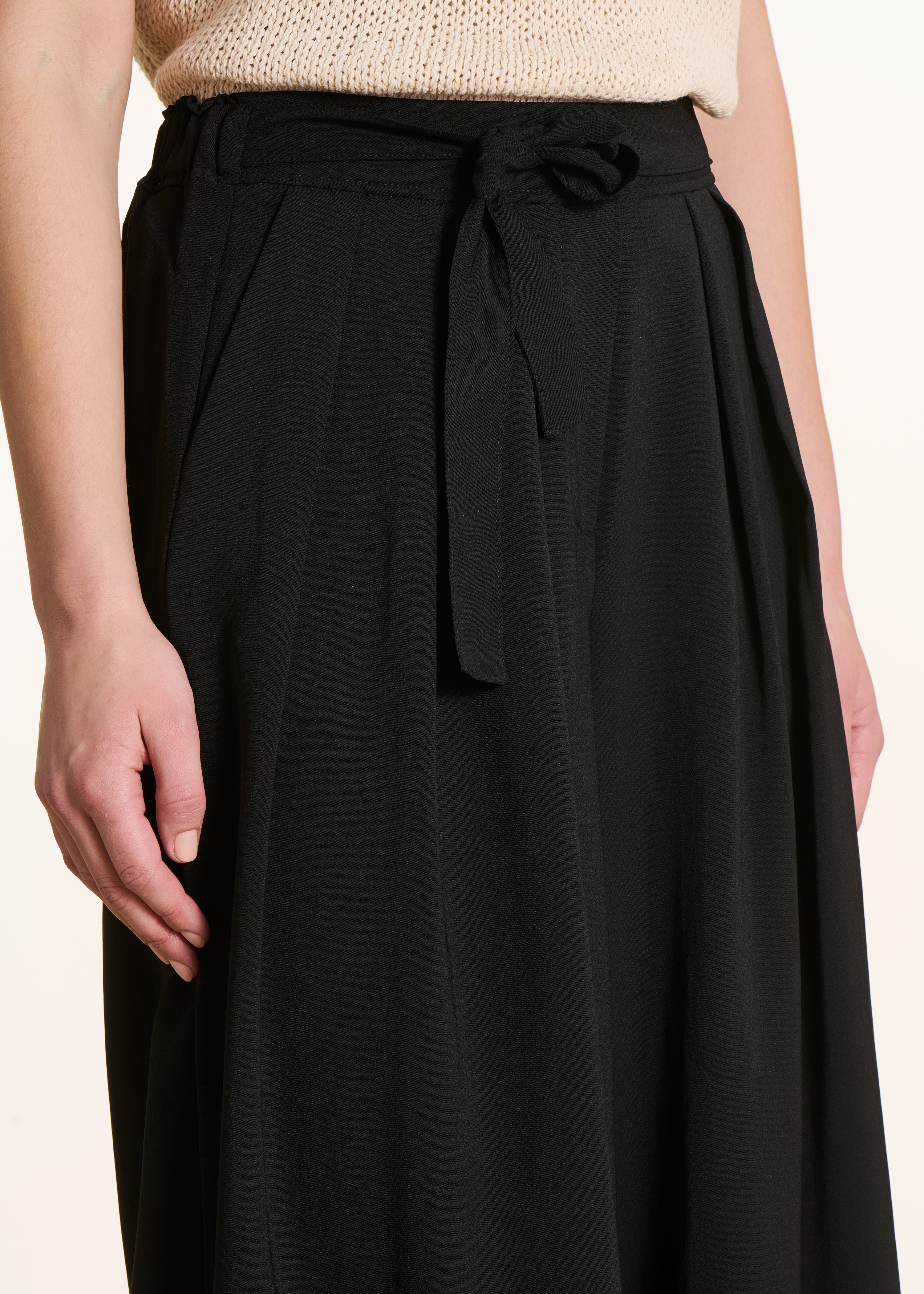 Wide black pleated pants with elastic waist