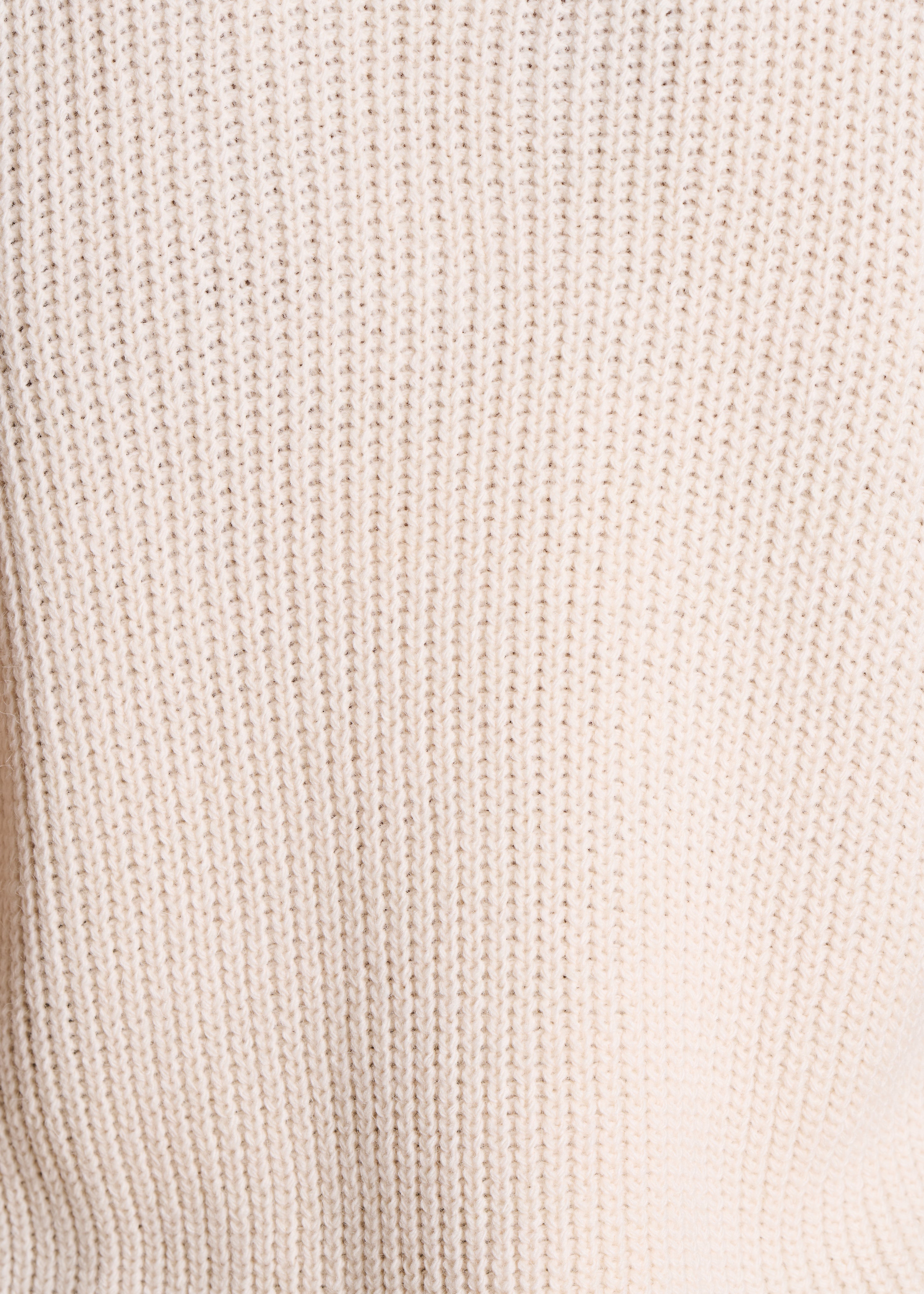 Pull écru sans manches col V