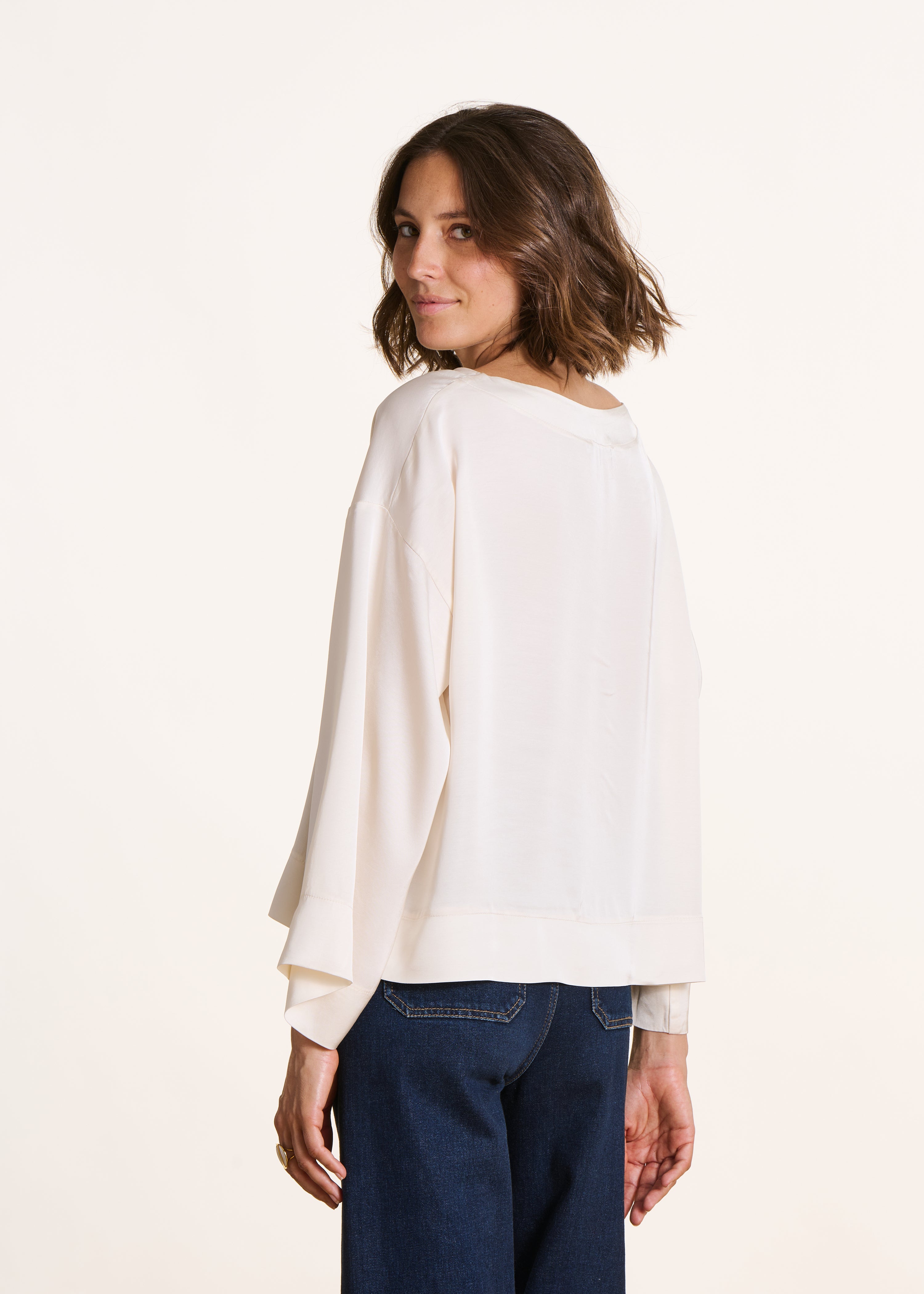 Loose off-white satin top with long sleeves