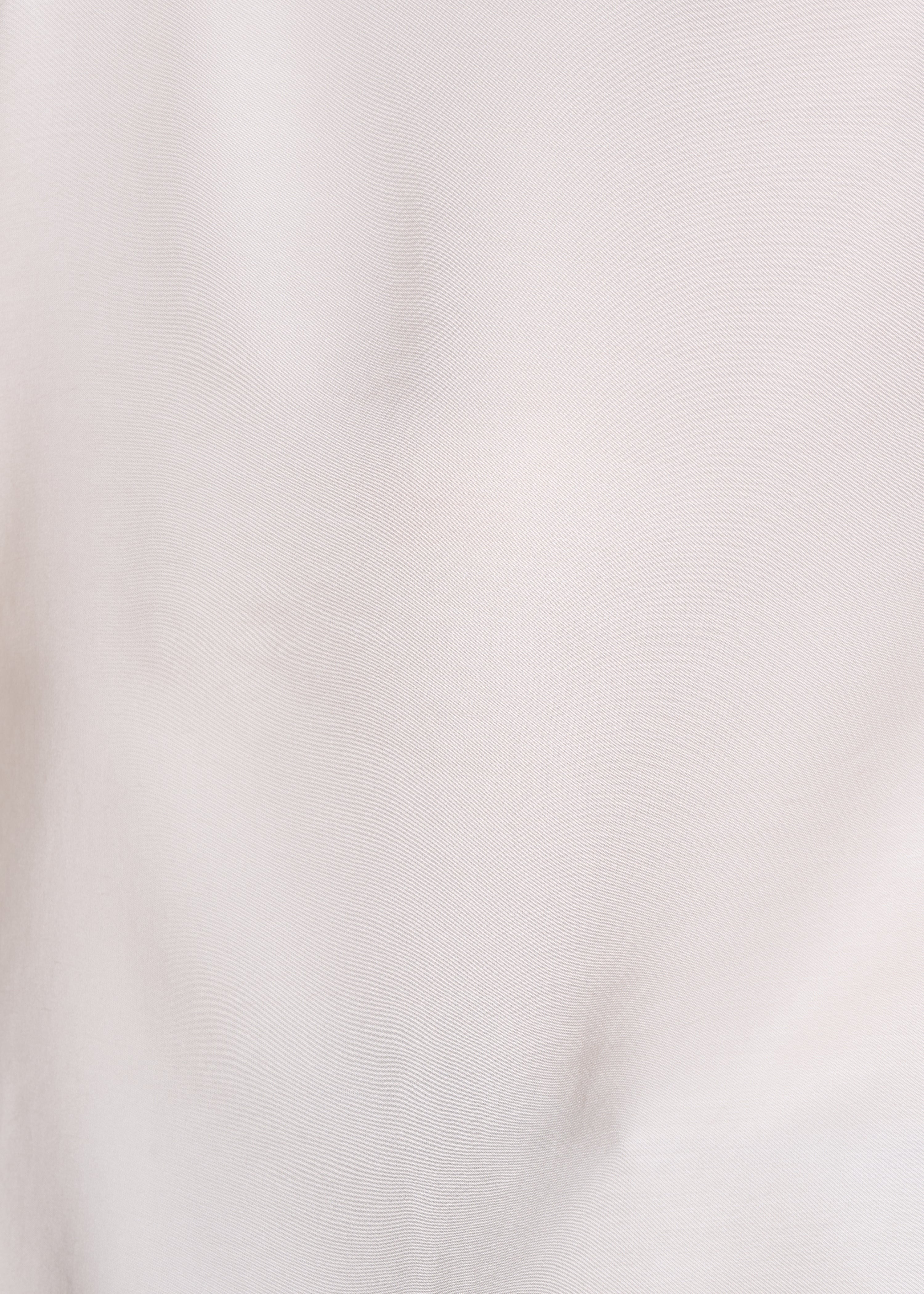 Loose off-white satin top with long sleeves