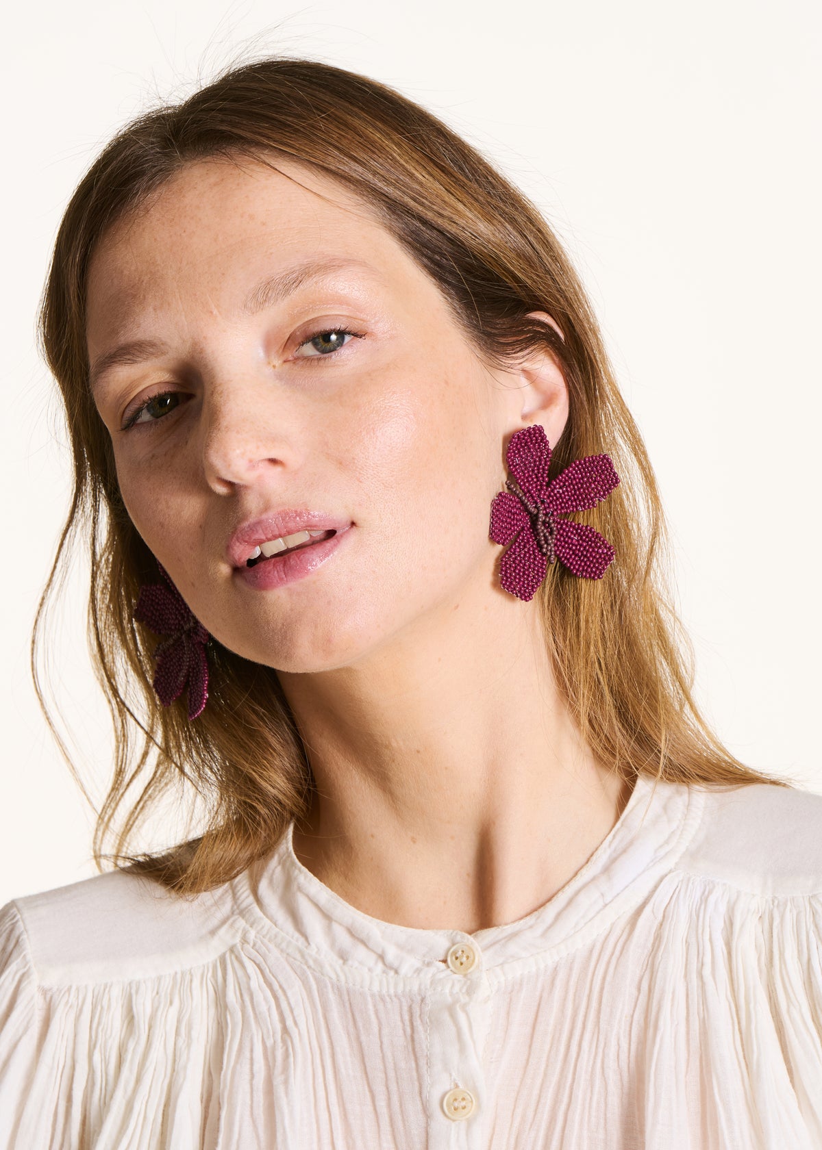 Boucles d'oreilles fleur en perles violettes