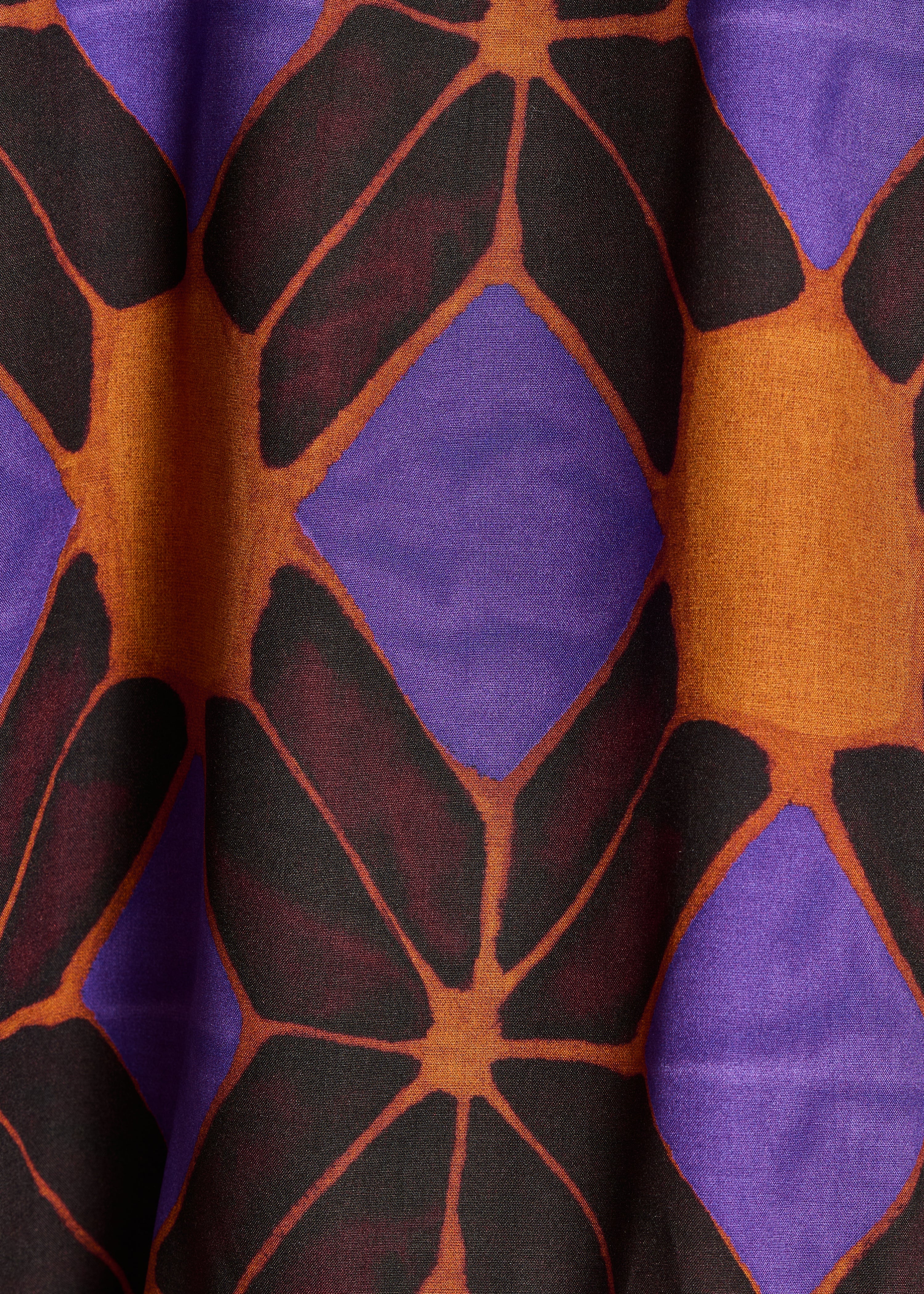 Camisa amplia con estampado naranja y violeta
