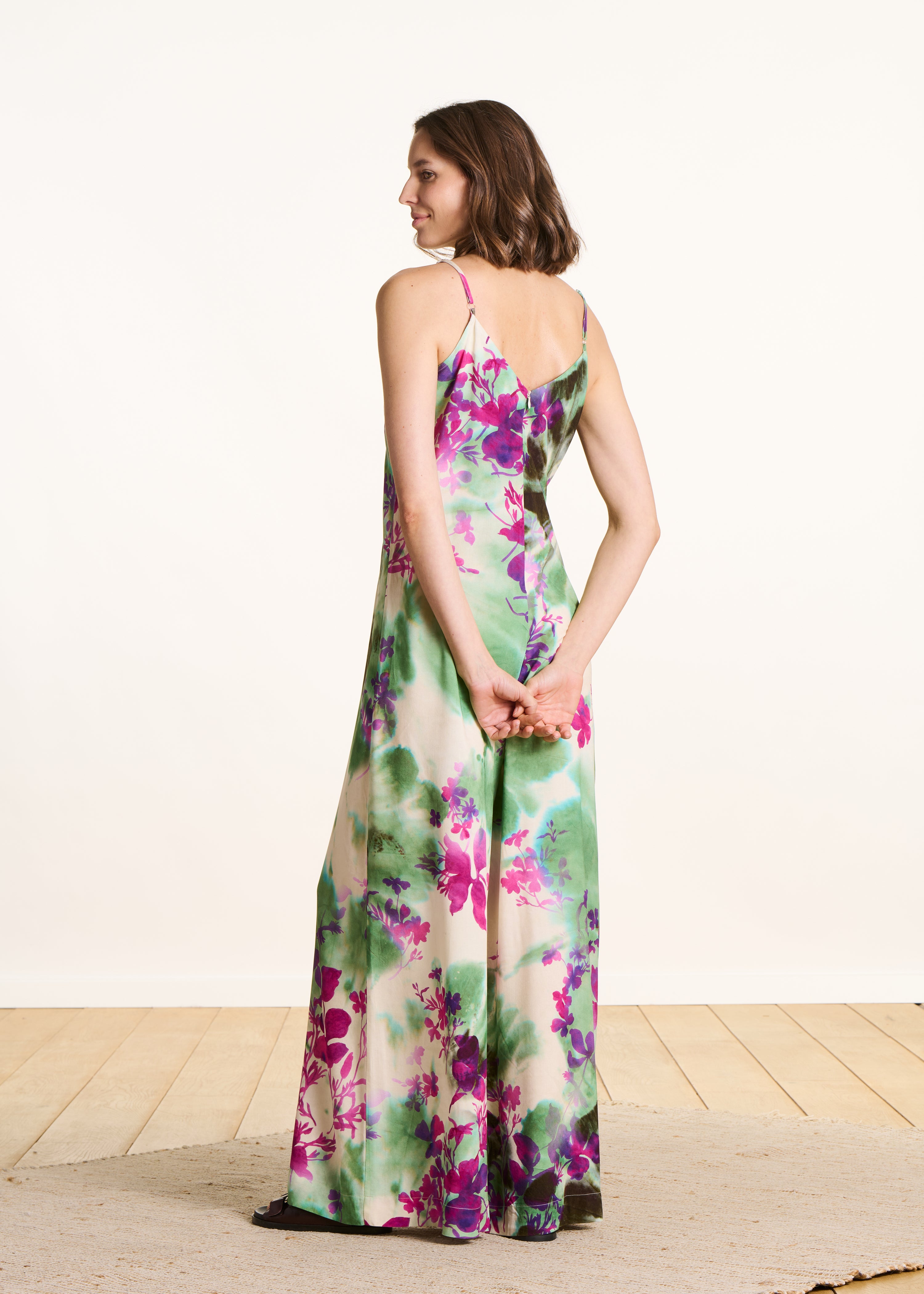 Green and pink floral print jumpsuit with straps