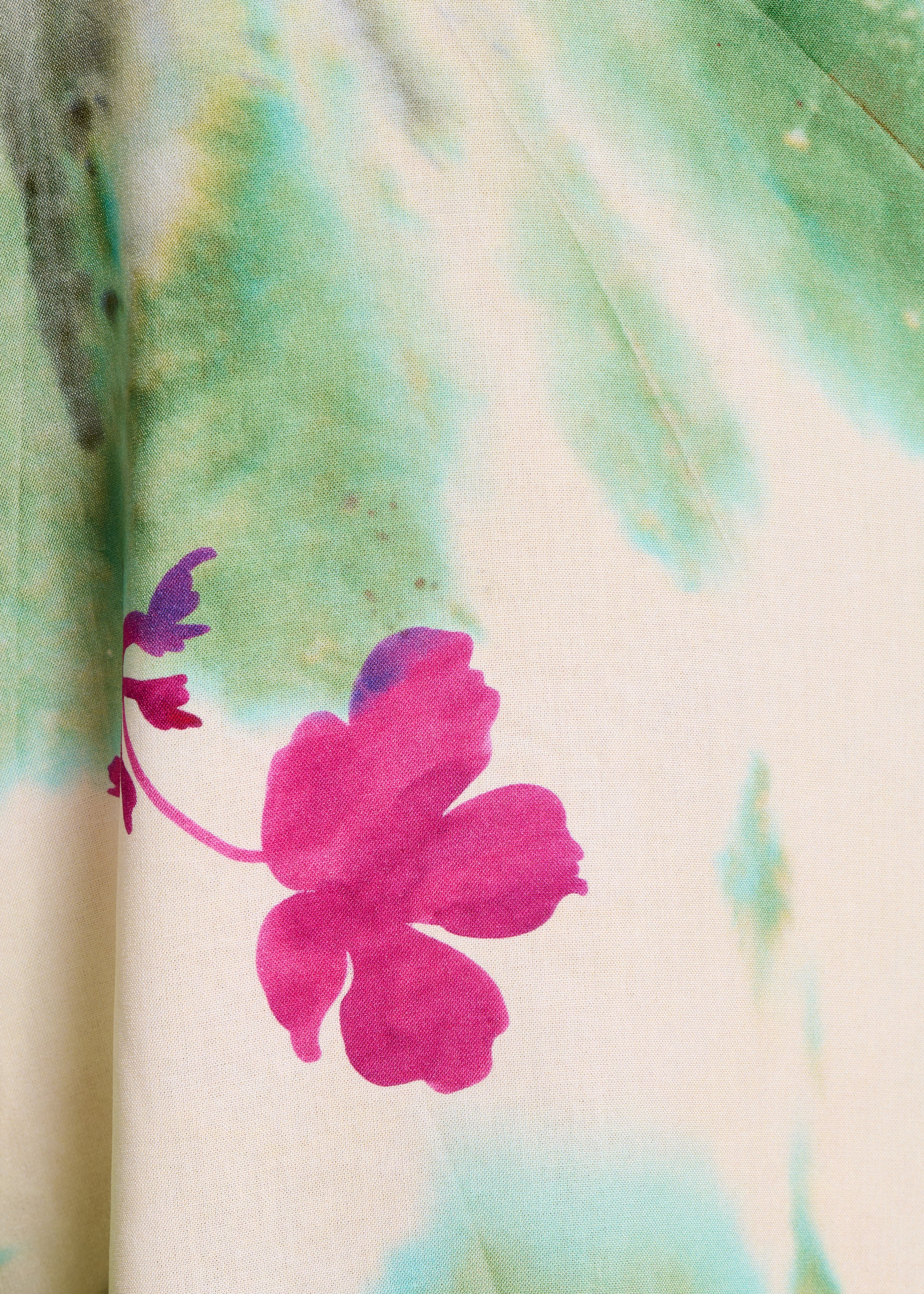 Green and pink floral print jumpsuit with straps