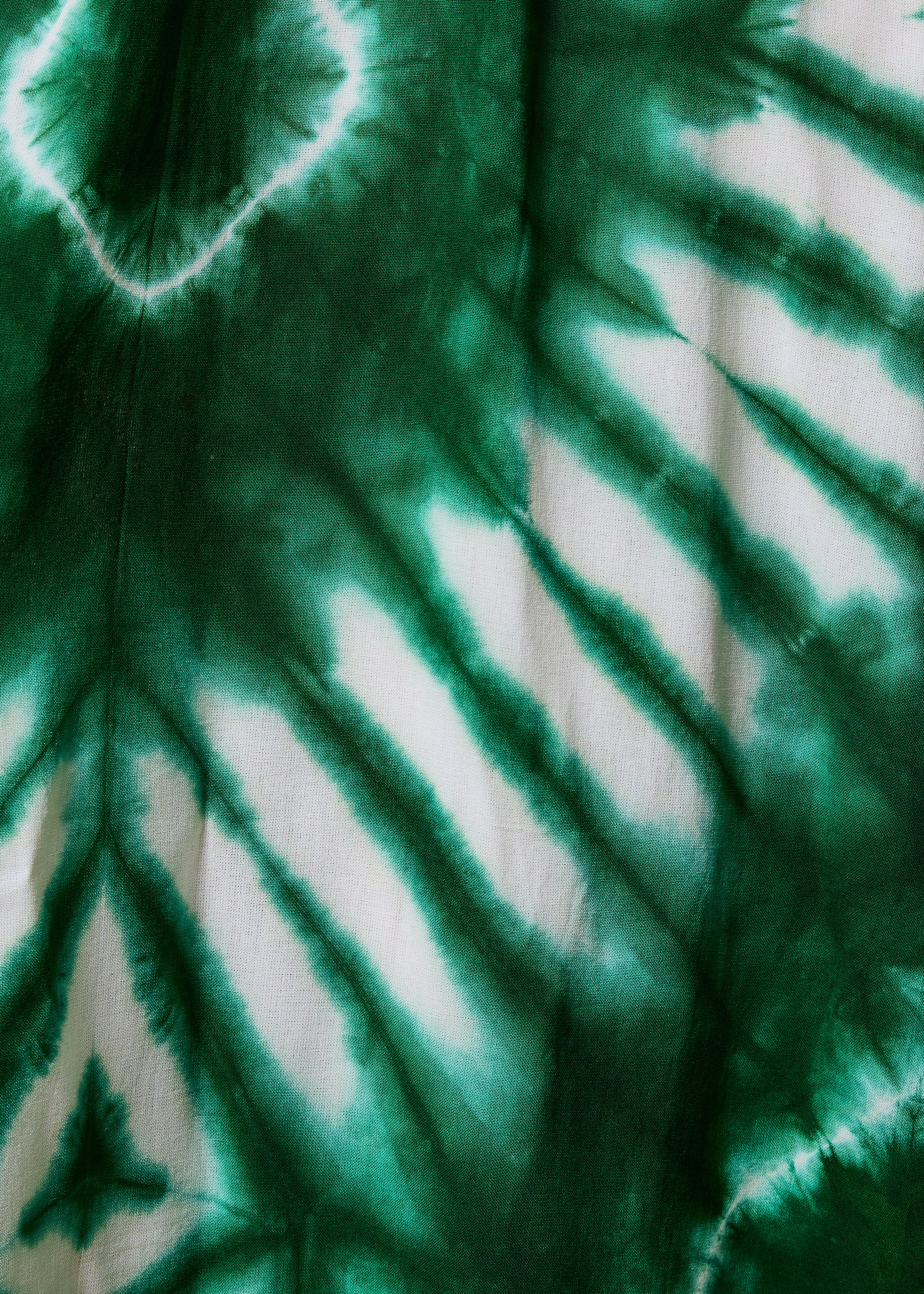 Tuta ampia verde con spalline stampate