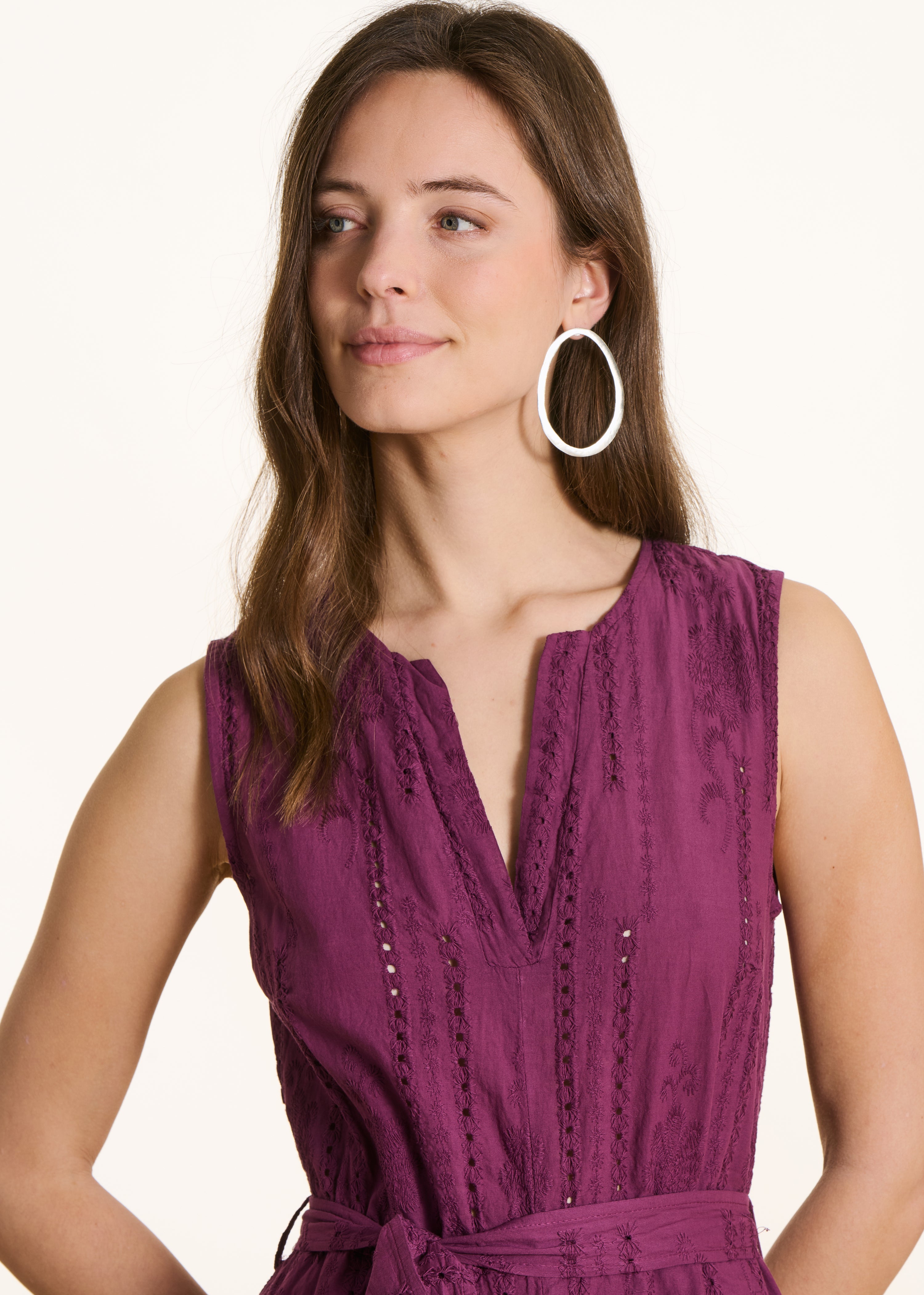 Purple jumpsuit in eyelet embroidery