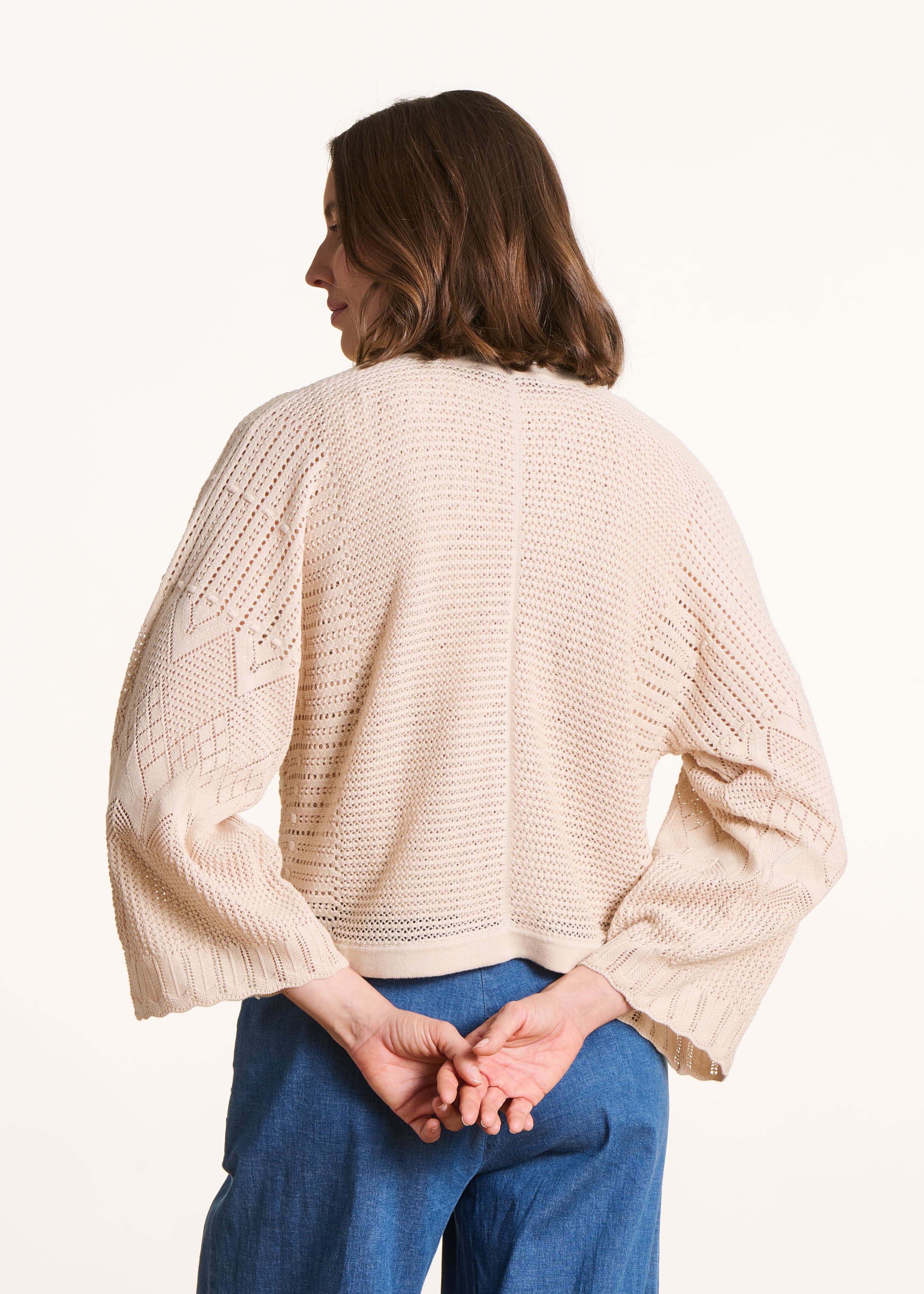 Gilet corto beige in maglia pointelle