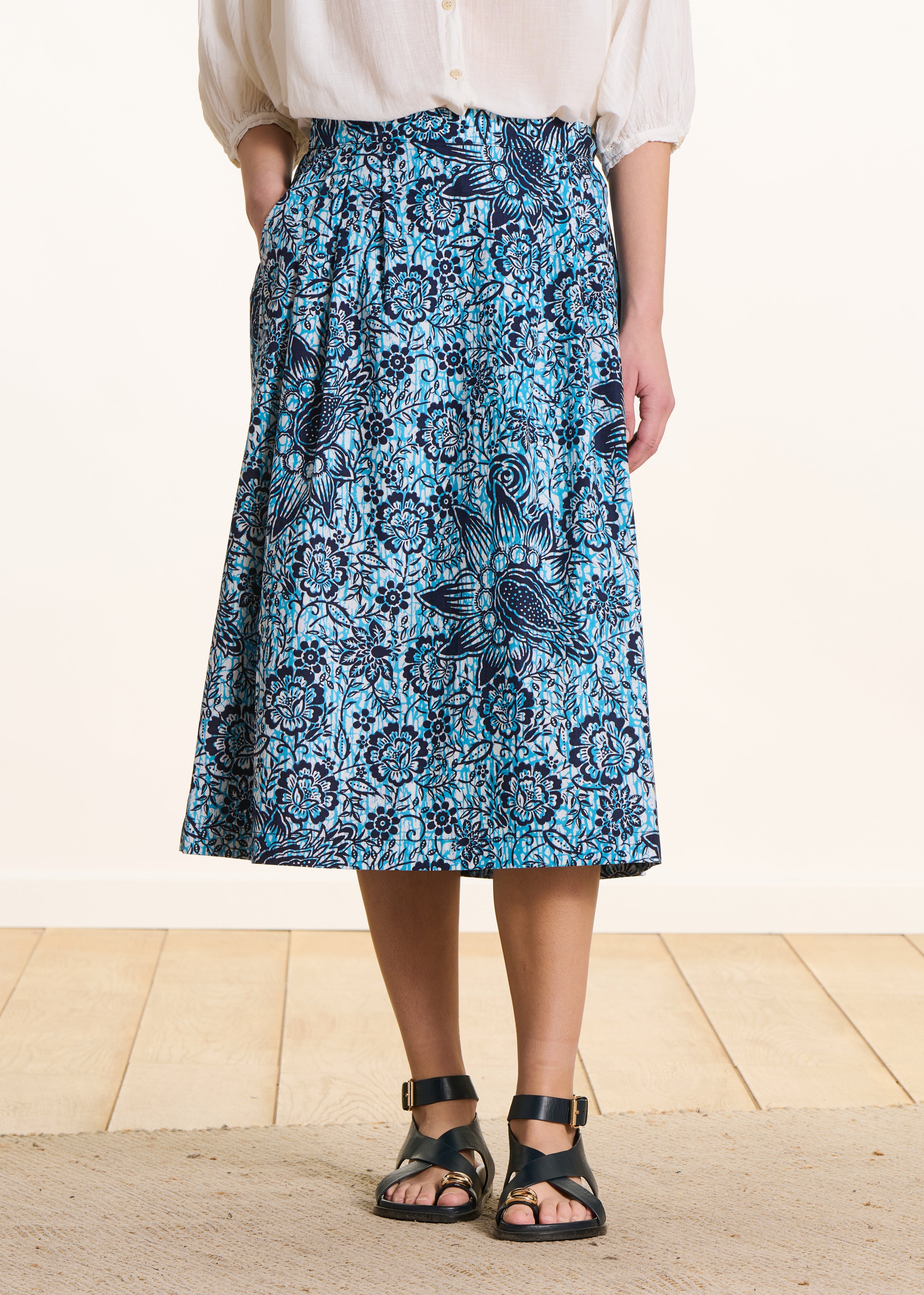 Long blue cotton poplin skirt with floral print