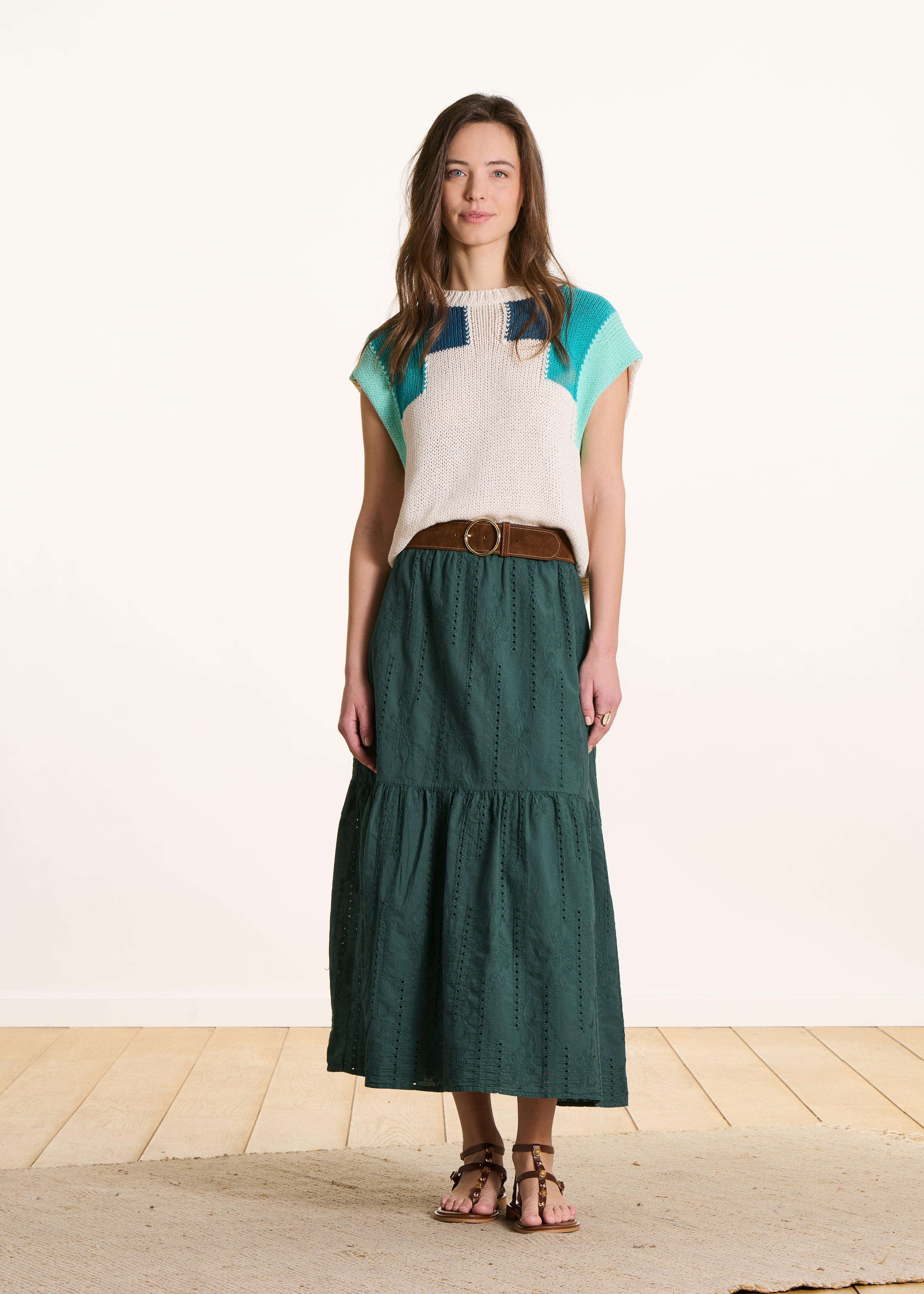 Dark green long skirt with ruffles in eyelet embroidery