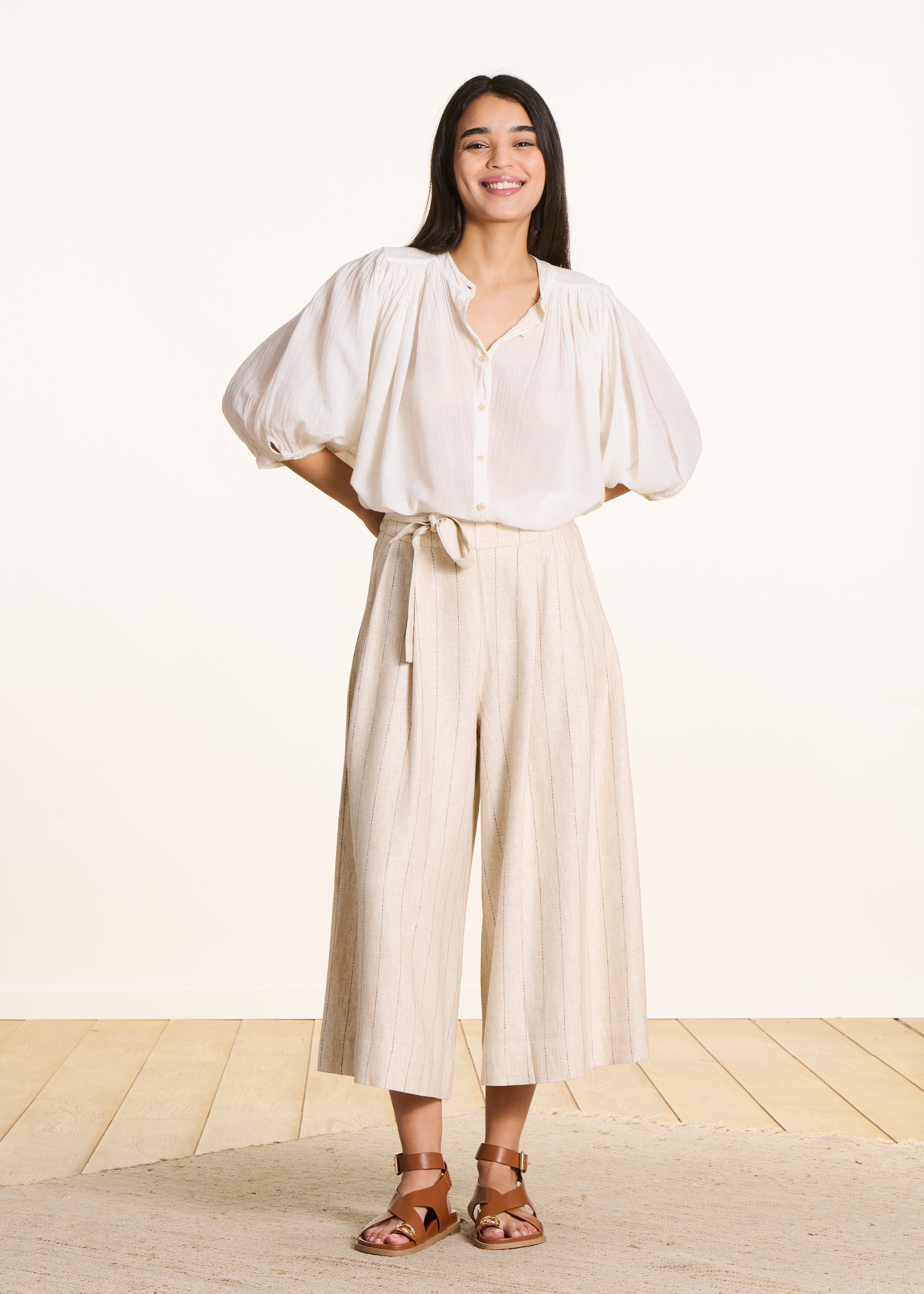 Weite gestreifte Hose in Beige mit hoher Taille