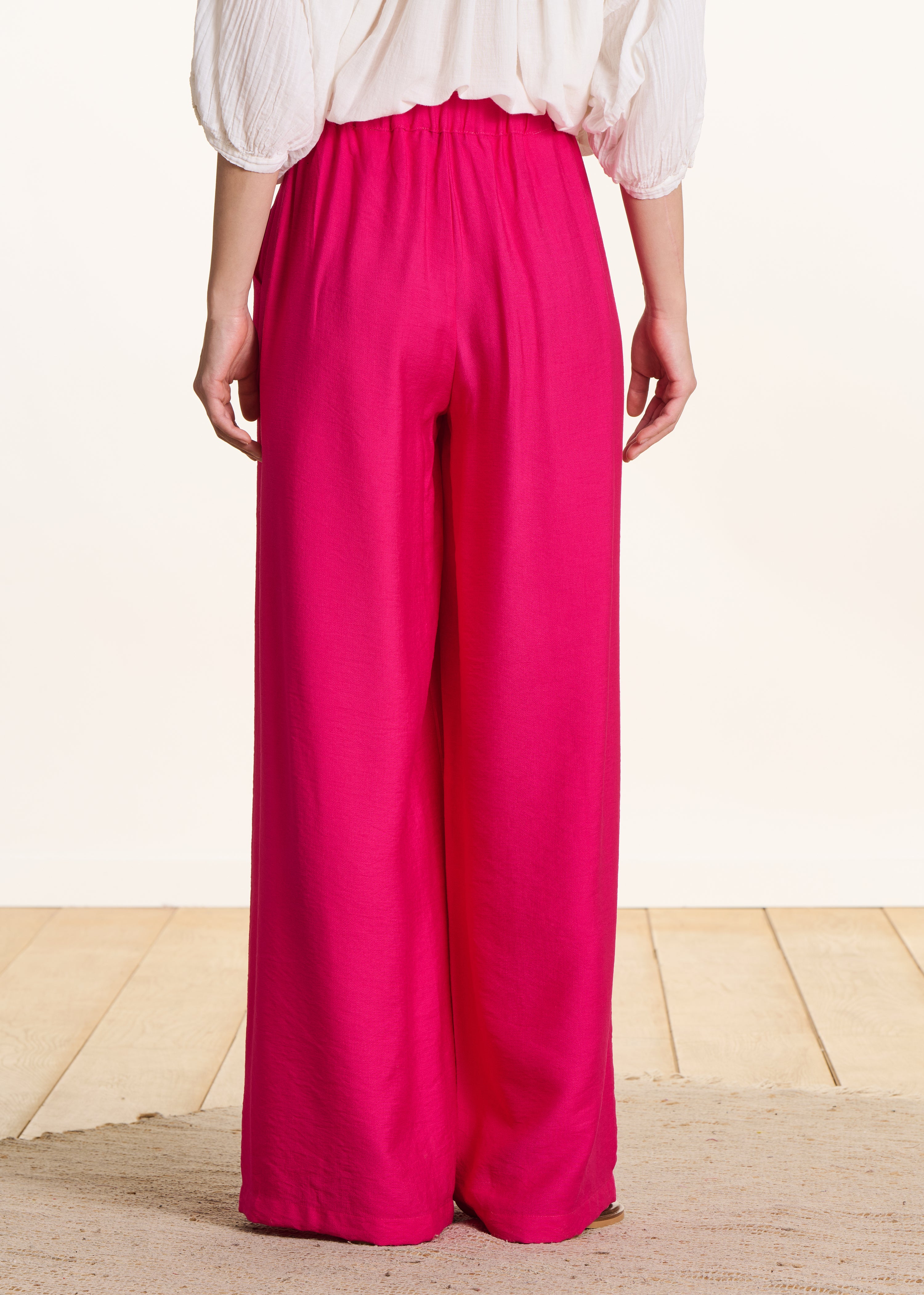 Wide fuchsia pink pants with elastic waistband