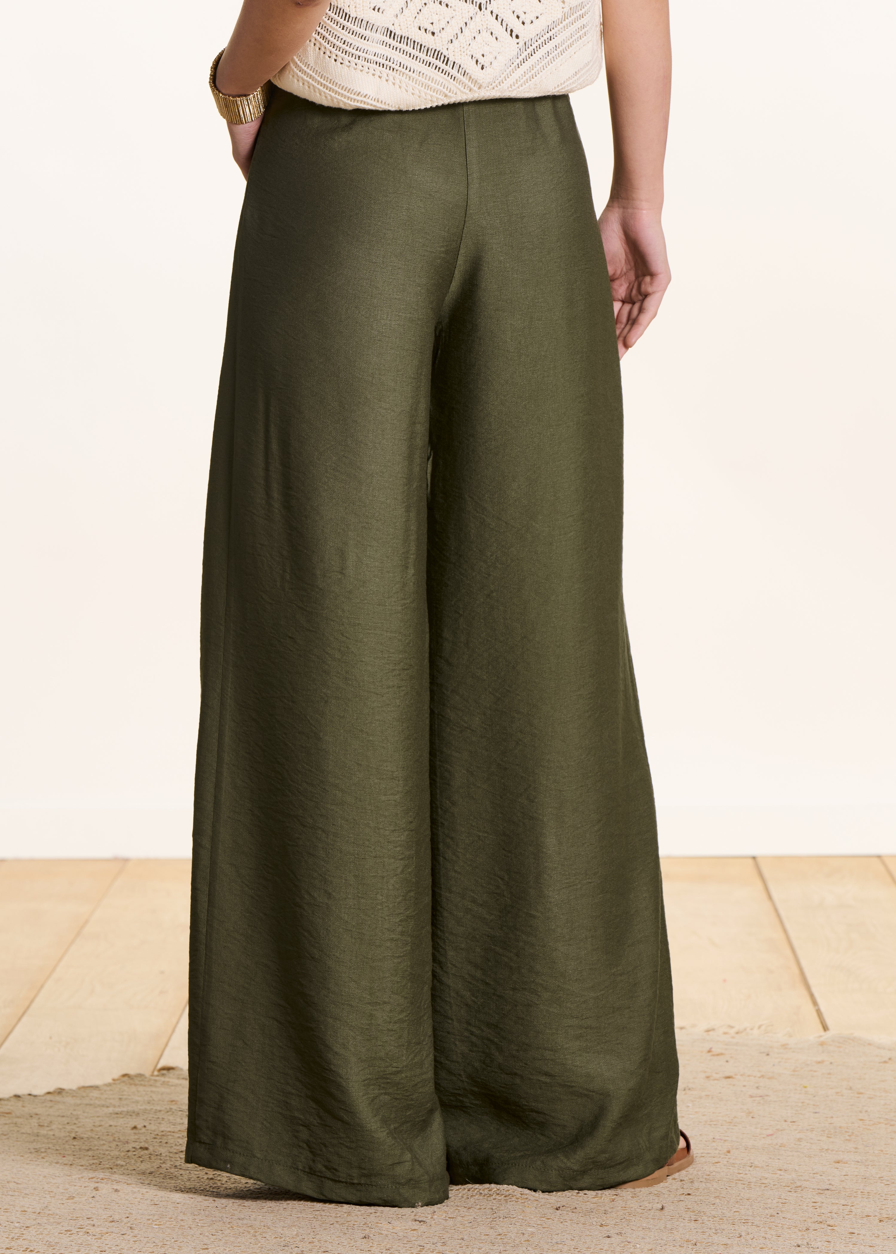 Long high-waisted elasticated khaki trousers