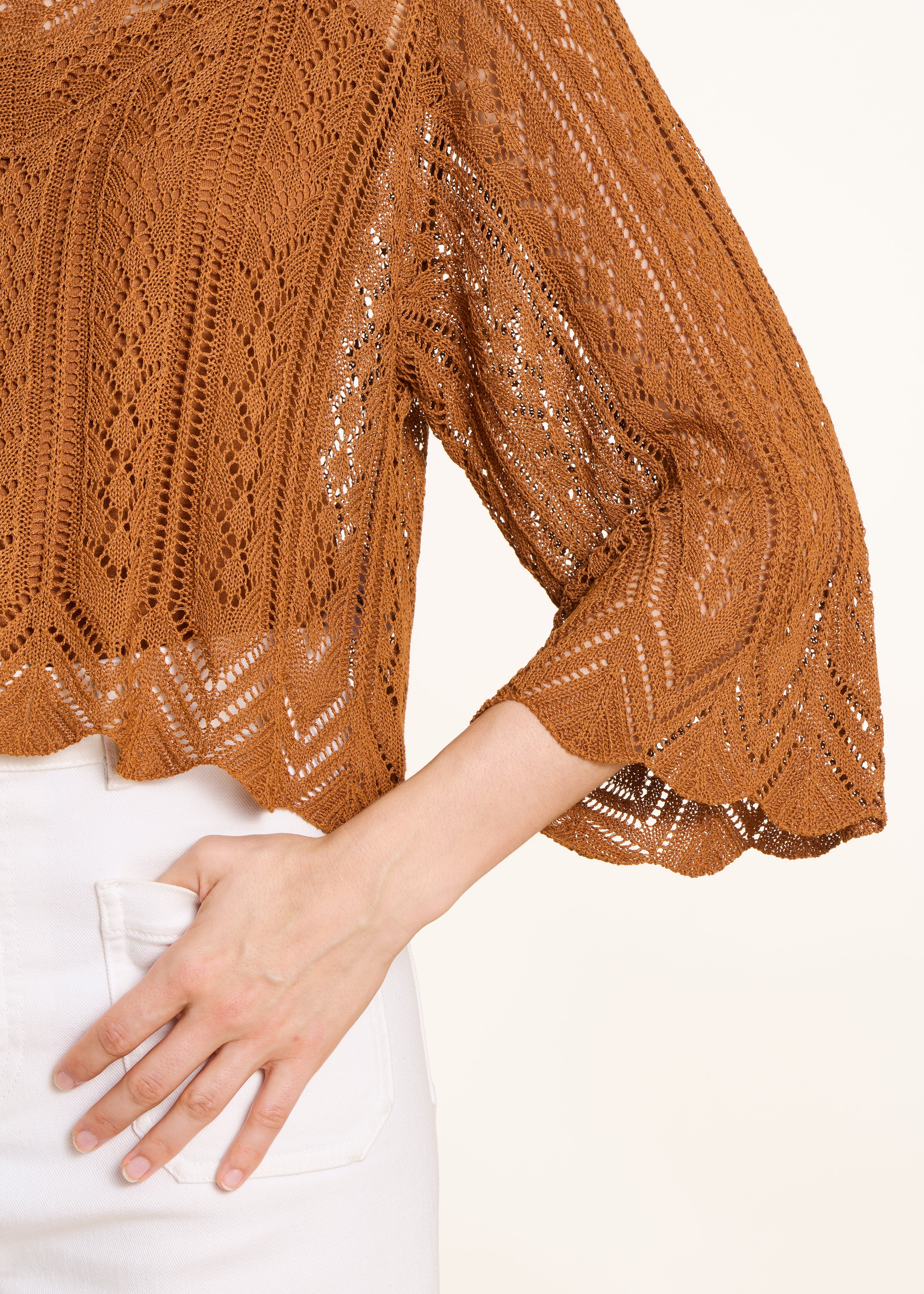 Short brown sweater in fine openwork knit