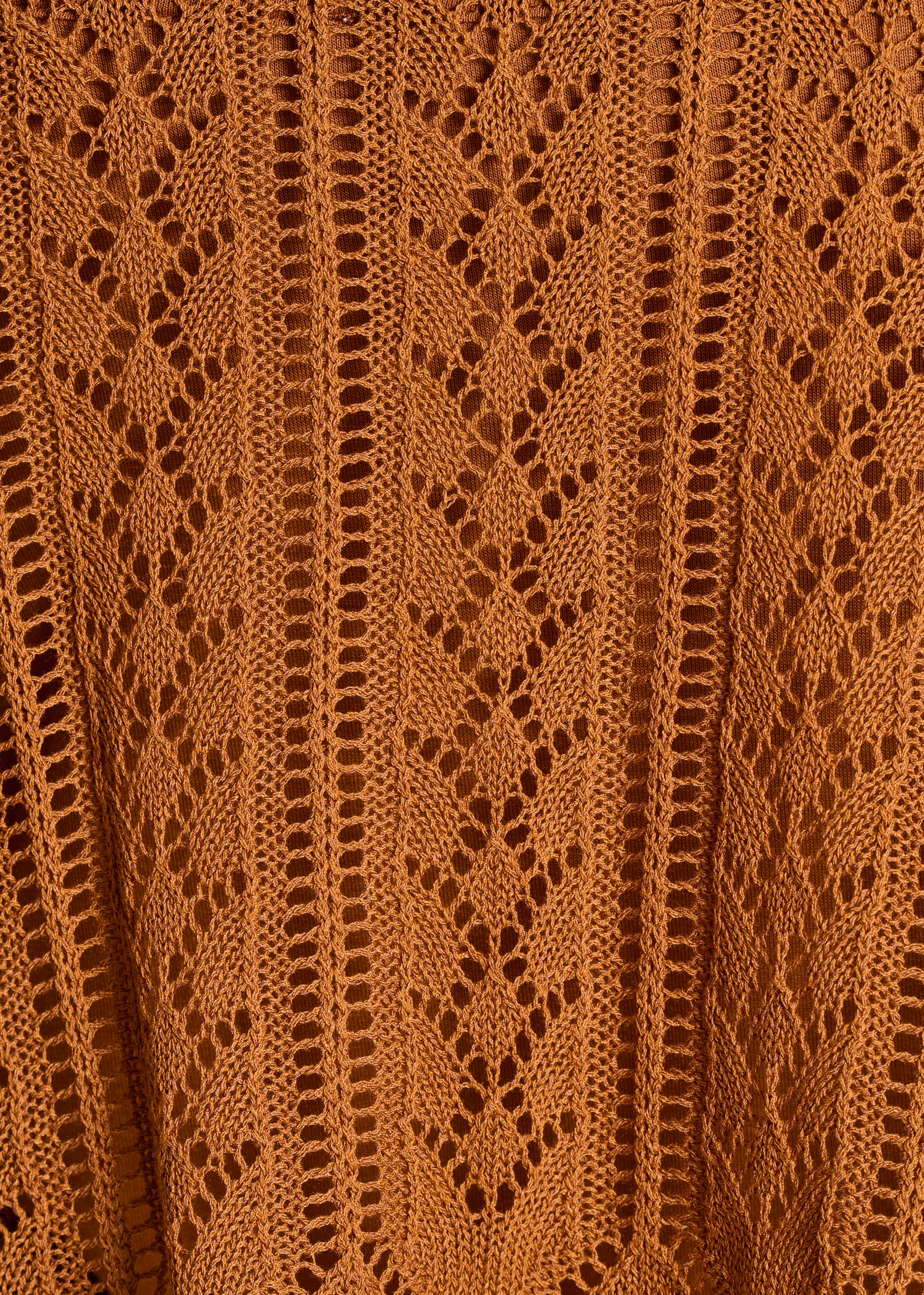 Short brown sweater in fine openwork knit