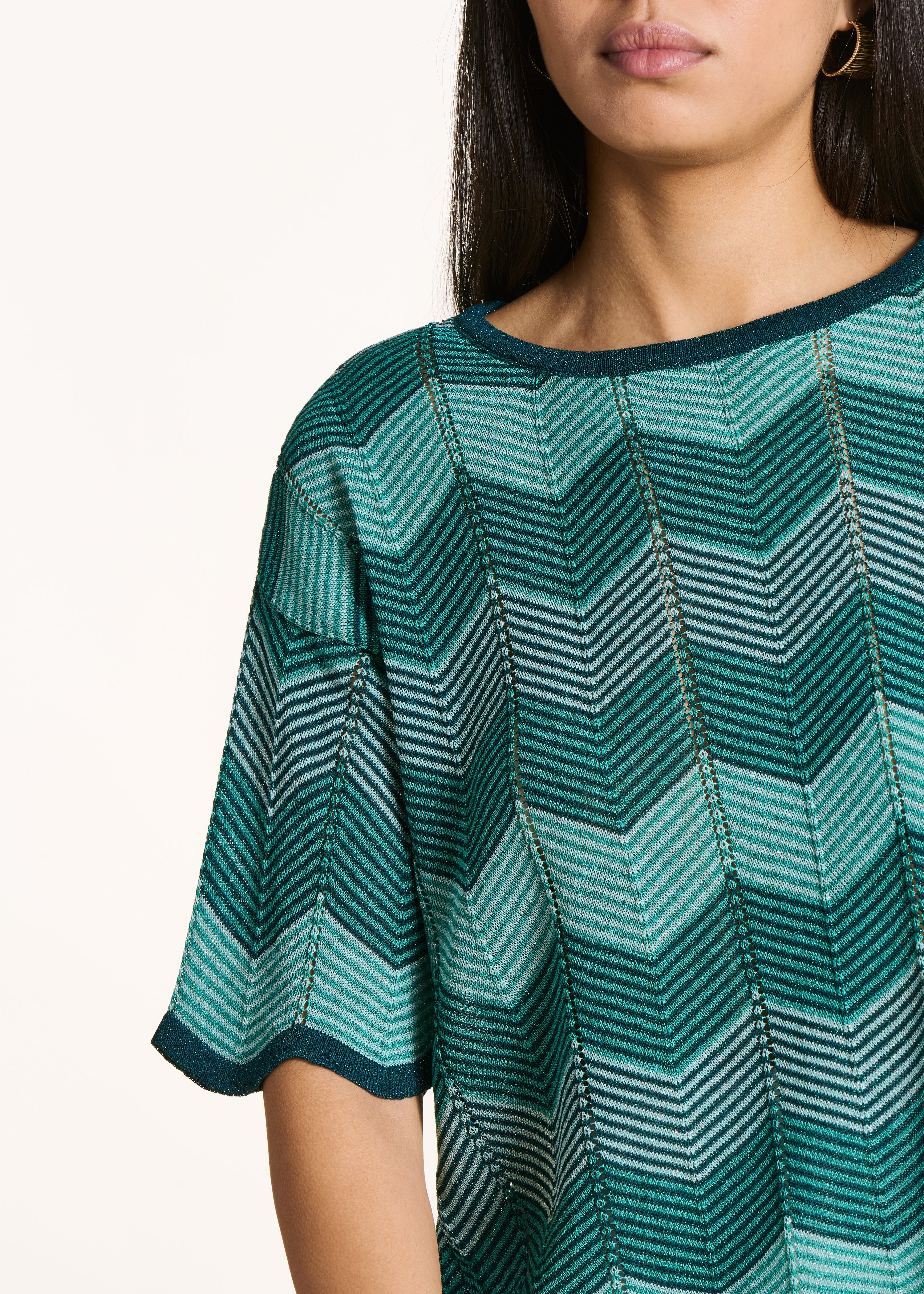 Short teal green sweater in shimmering knit