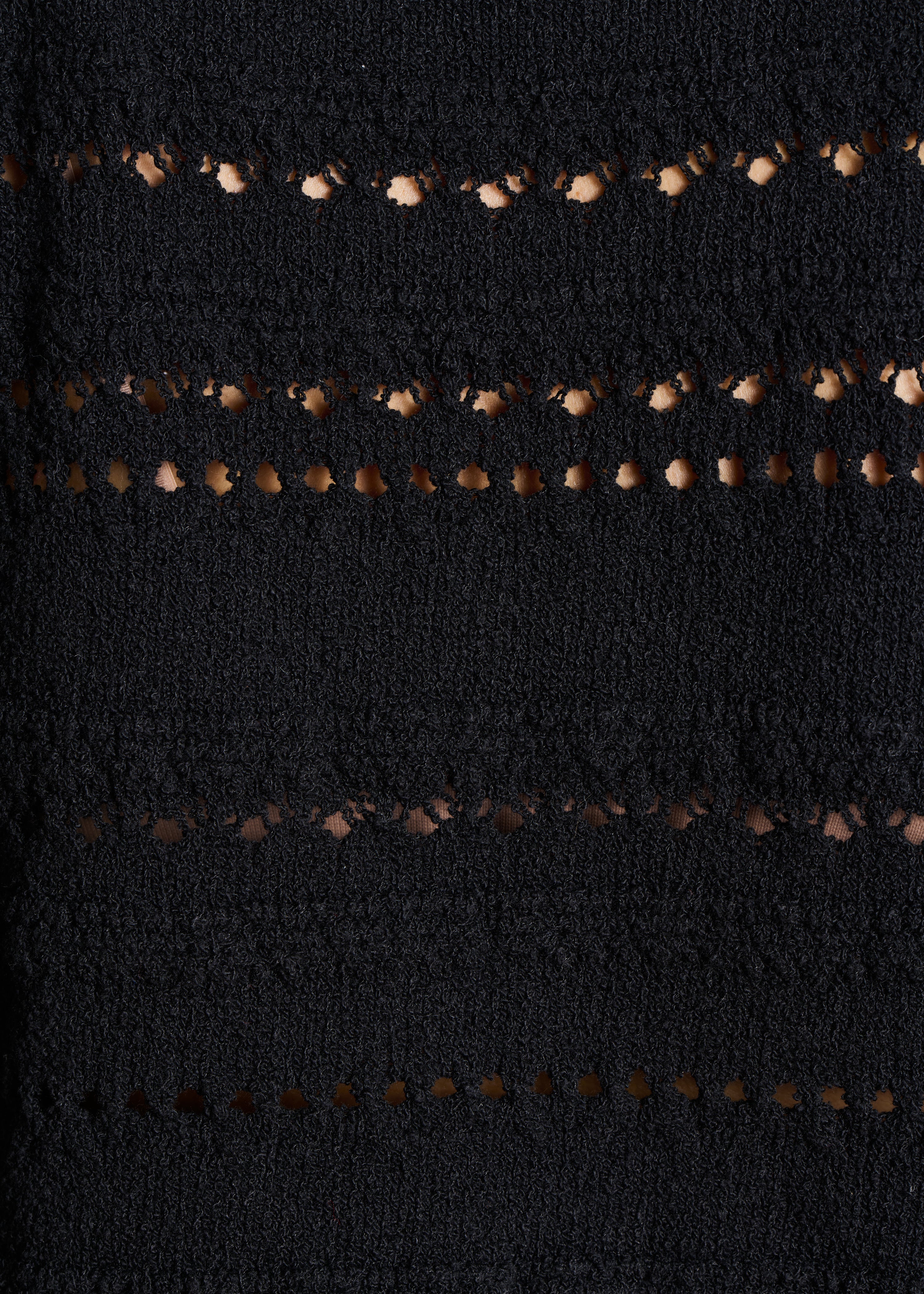Black openwork knit sweater with long sleeves