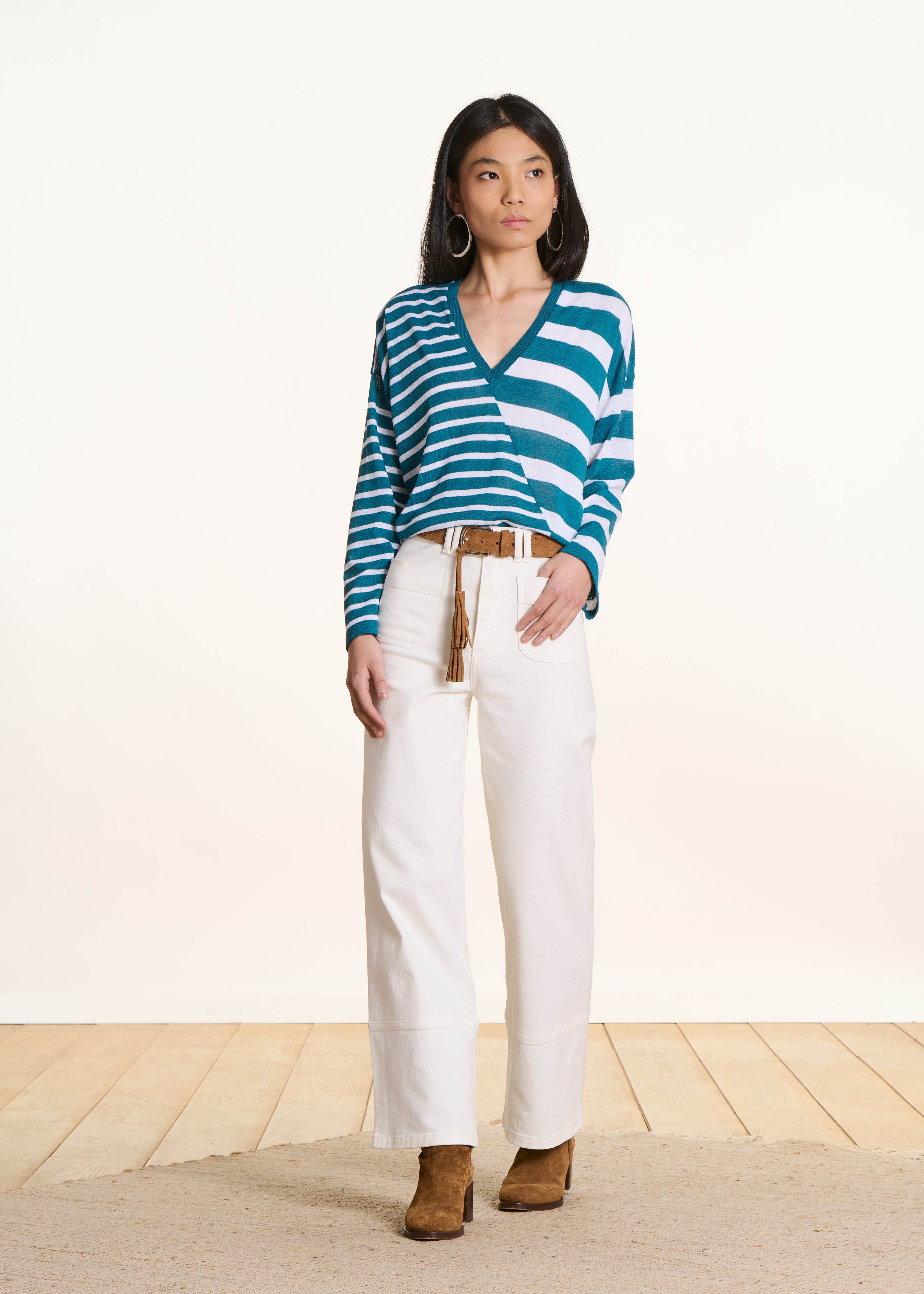 Loose petrol blue sweater with white stripes in fine knit, V-neck