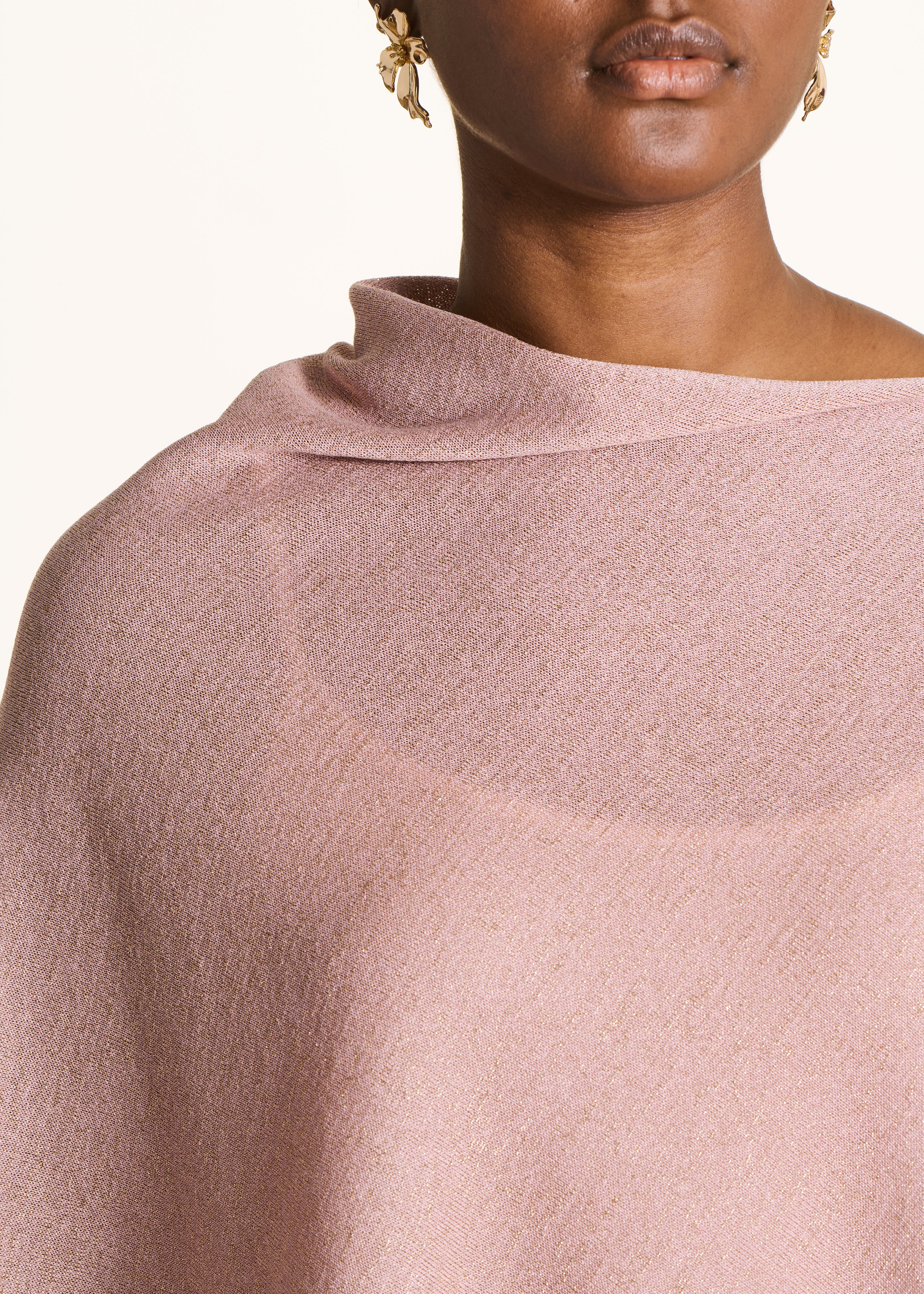 Light pink shimmering fine knit cape sweater