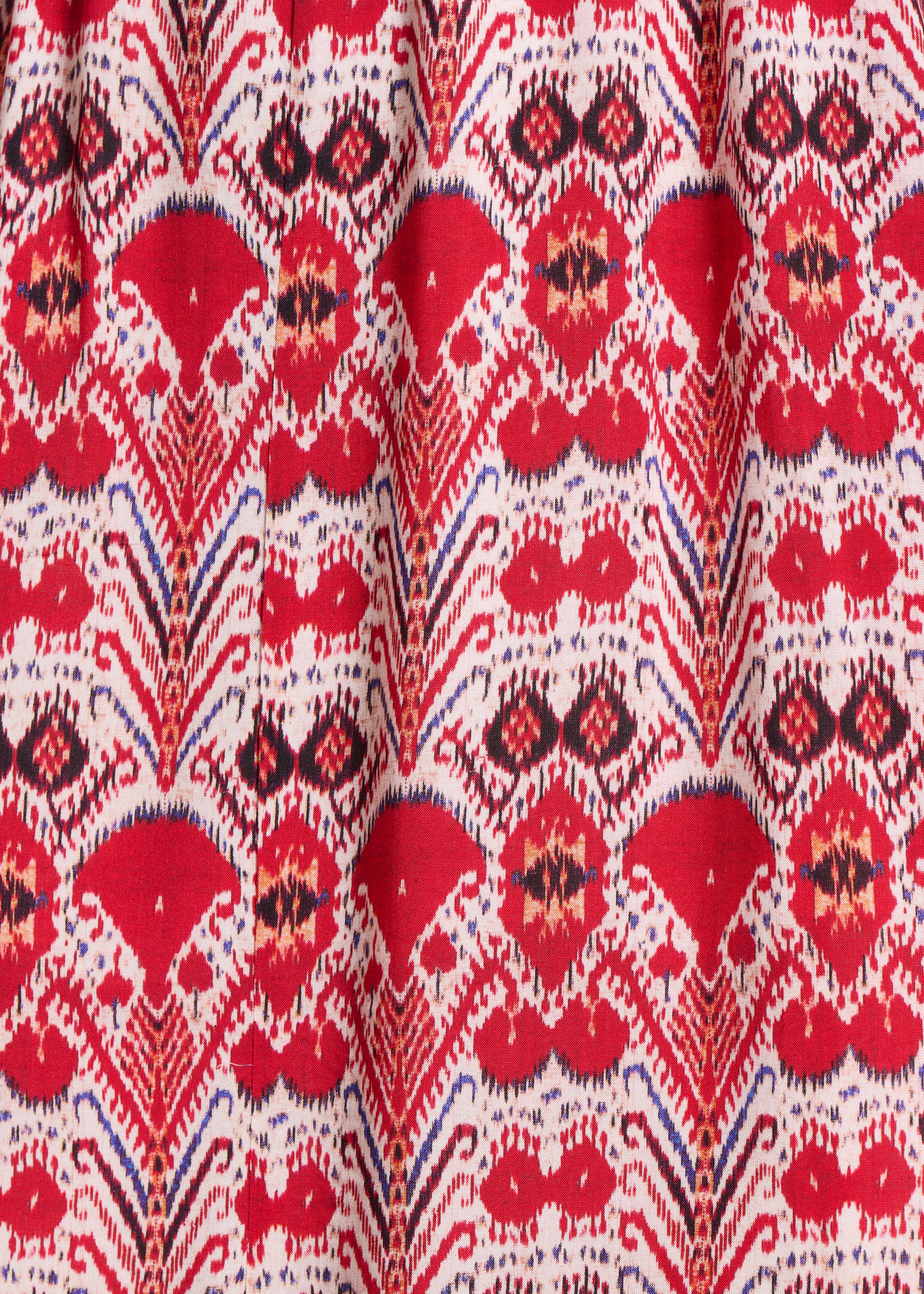 Lange wikkeljurk met rode print