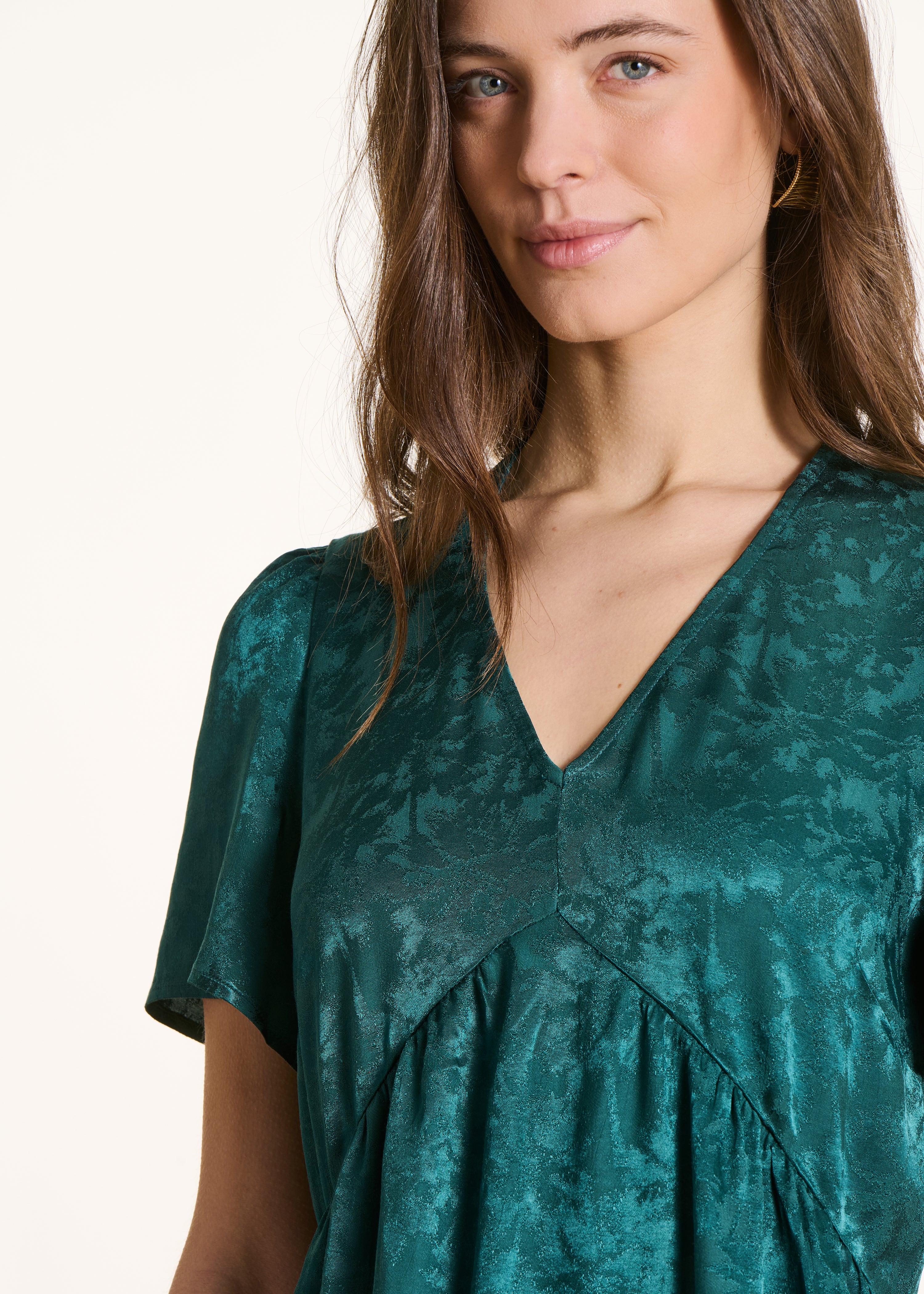Short flowing petrol green dress in jacquard