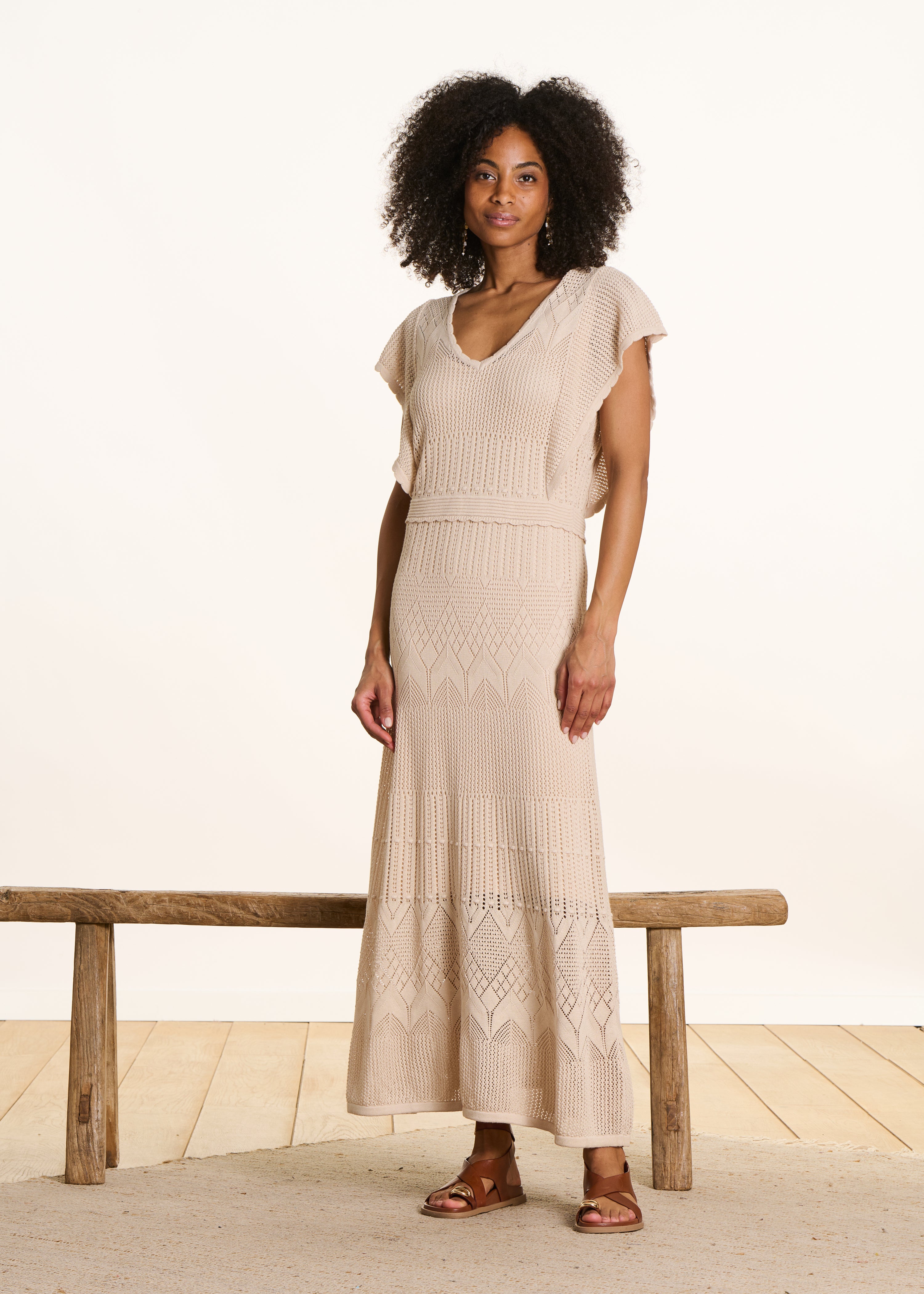 Beige lange jurk van pointelle gebreide stof