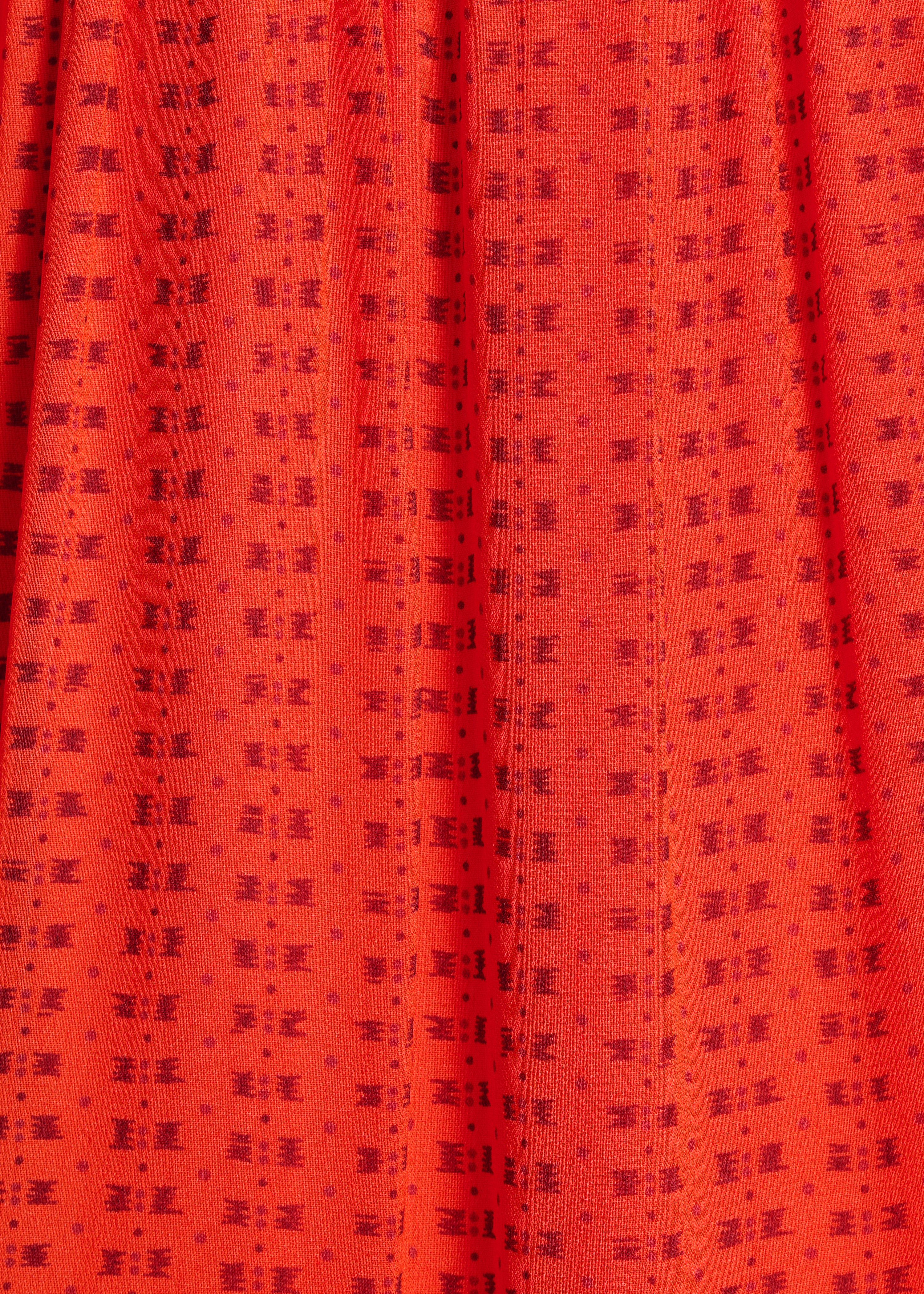 Vestido largo naranja estampado con volantes