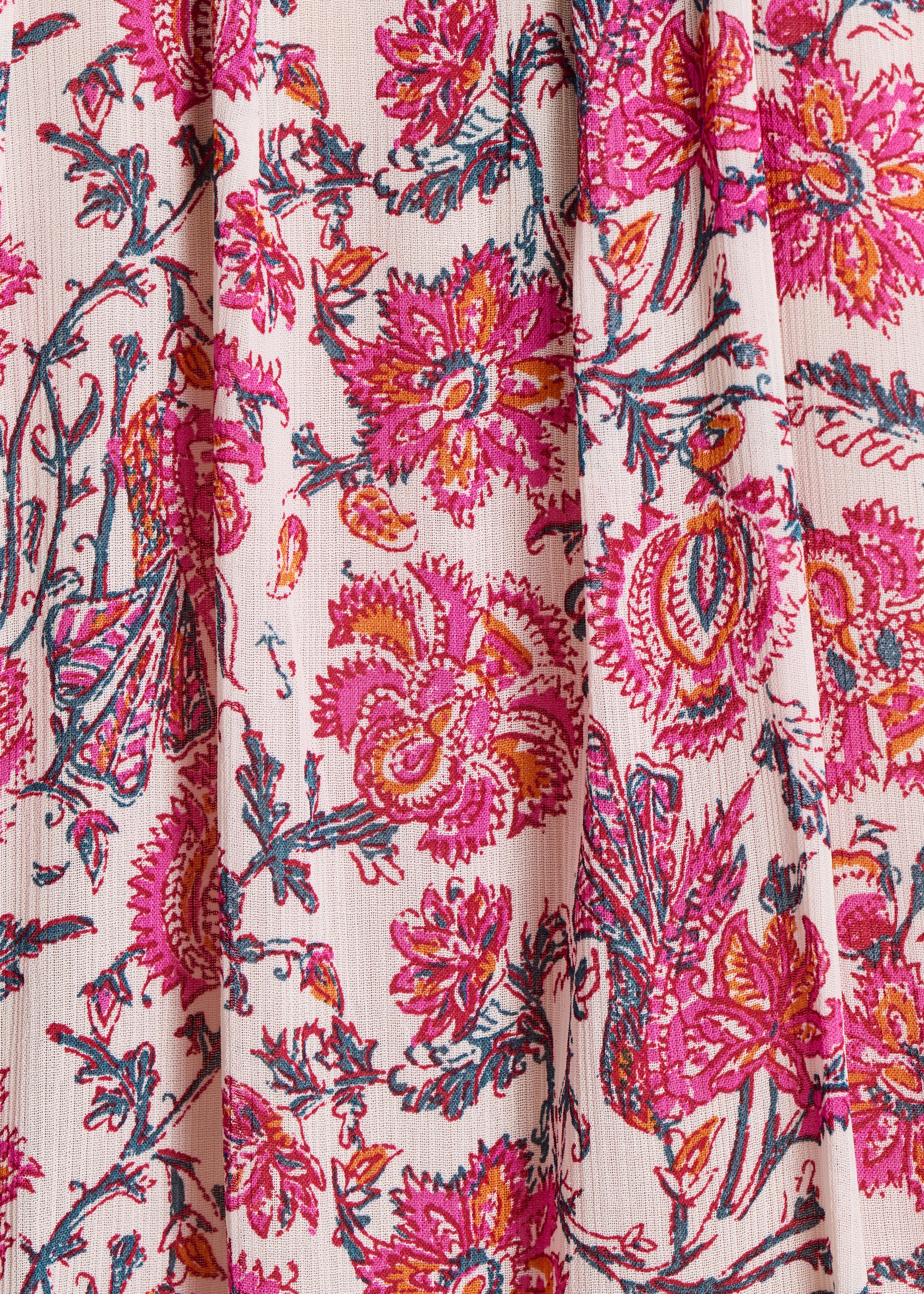 Top largo rosa com estampado floral e mangas compridas