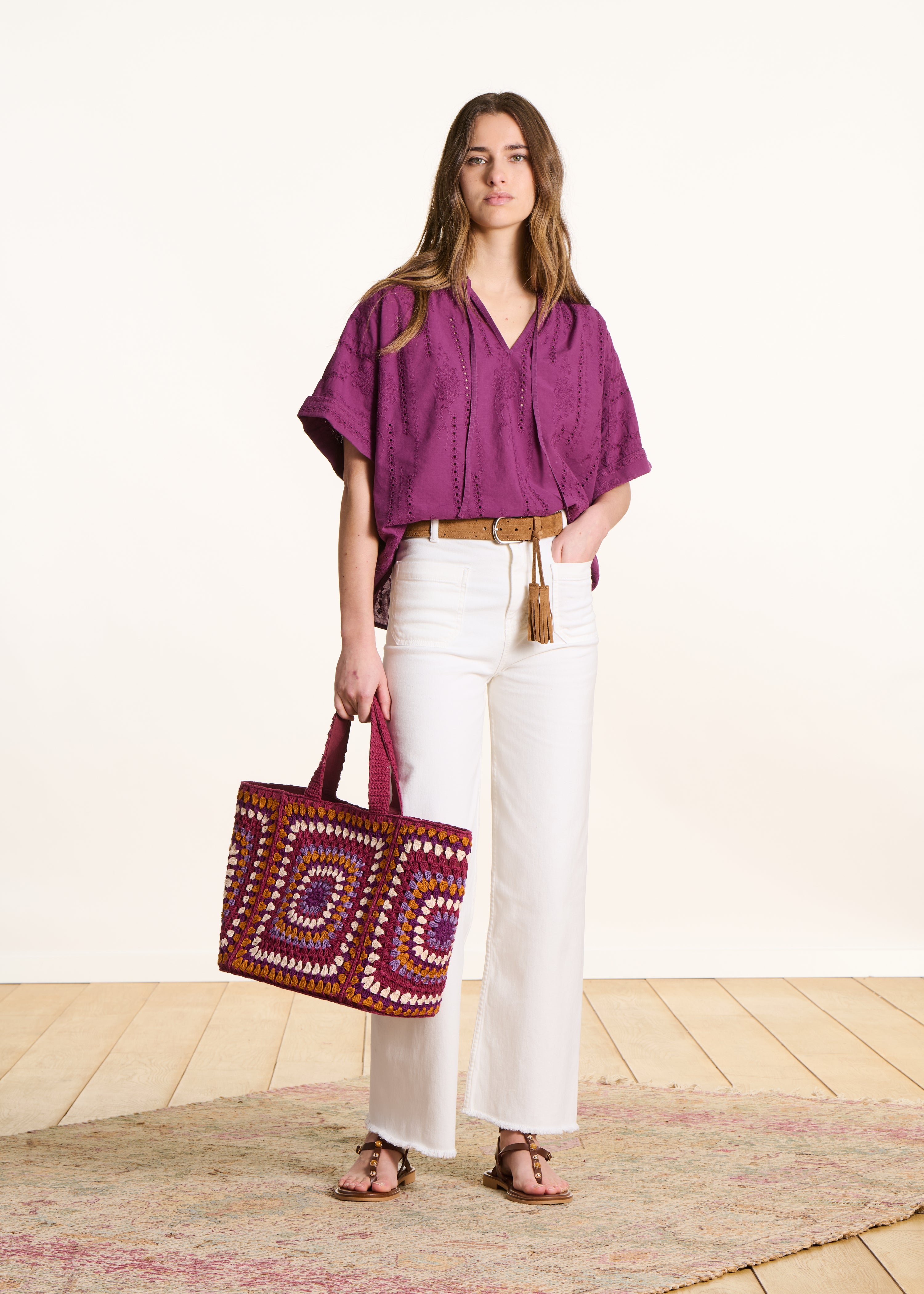 Loose purple blouse in eyelet embroidery