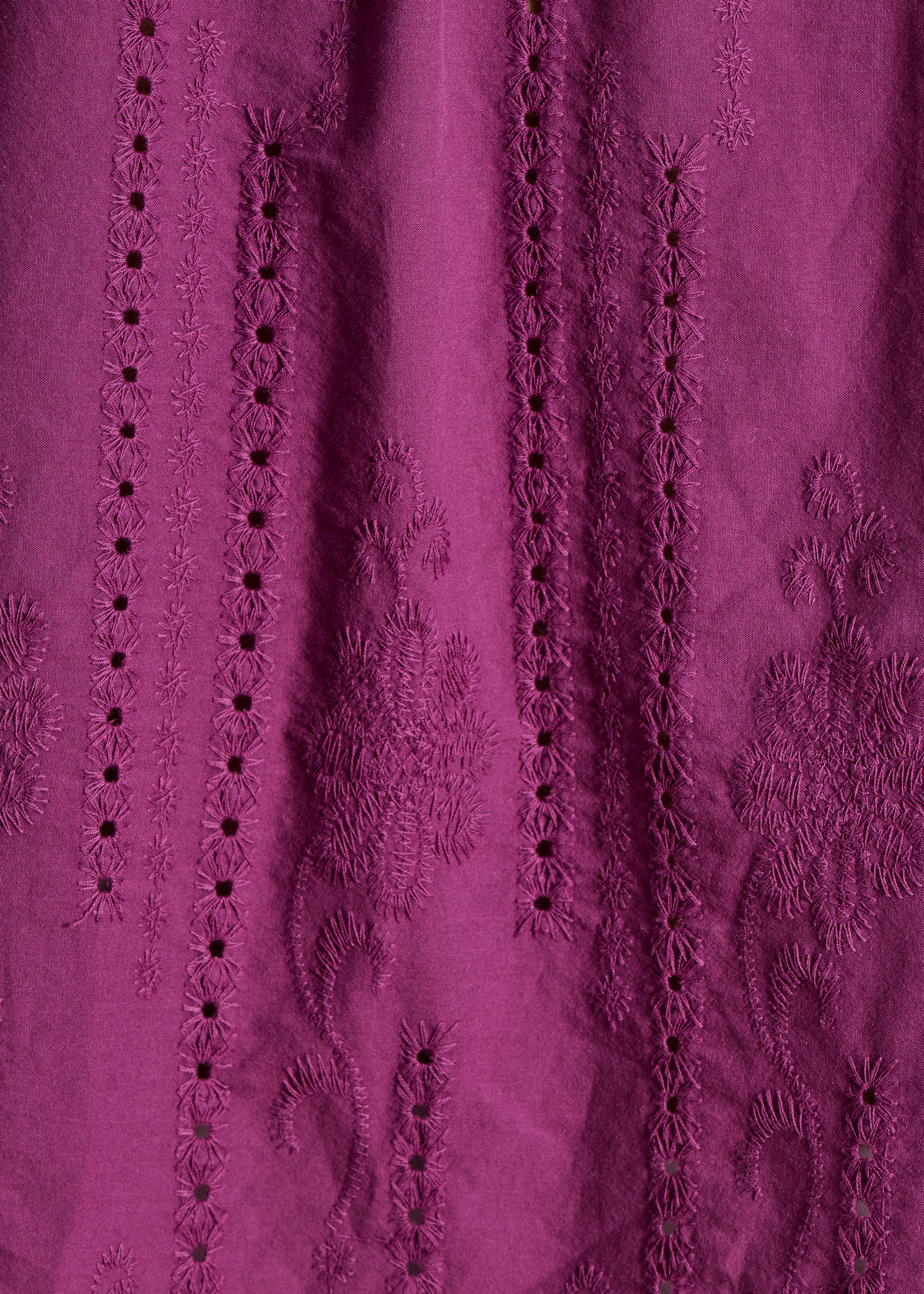 Loose purple blouse in eyelet embroidery
