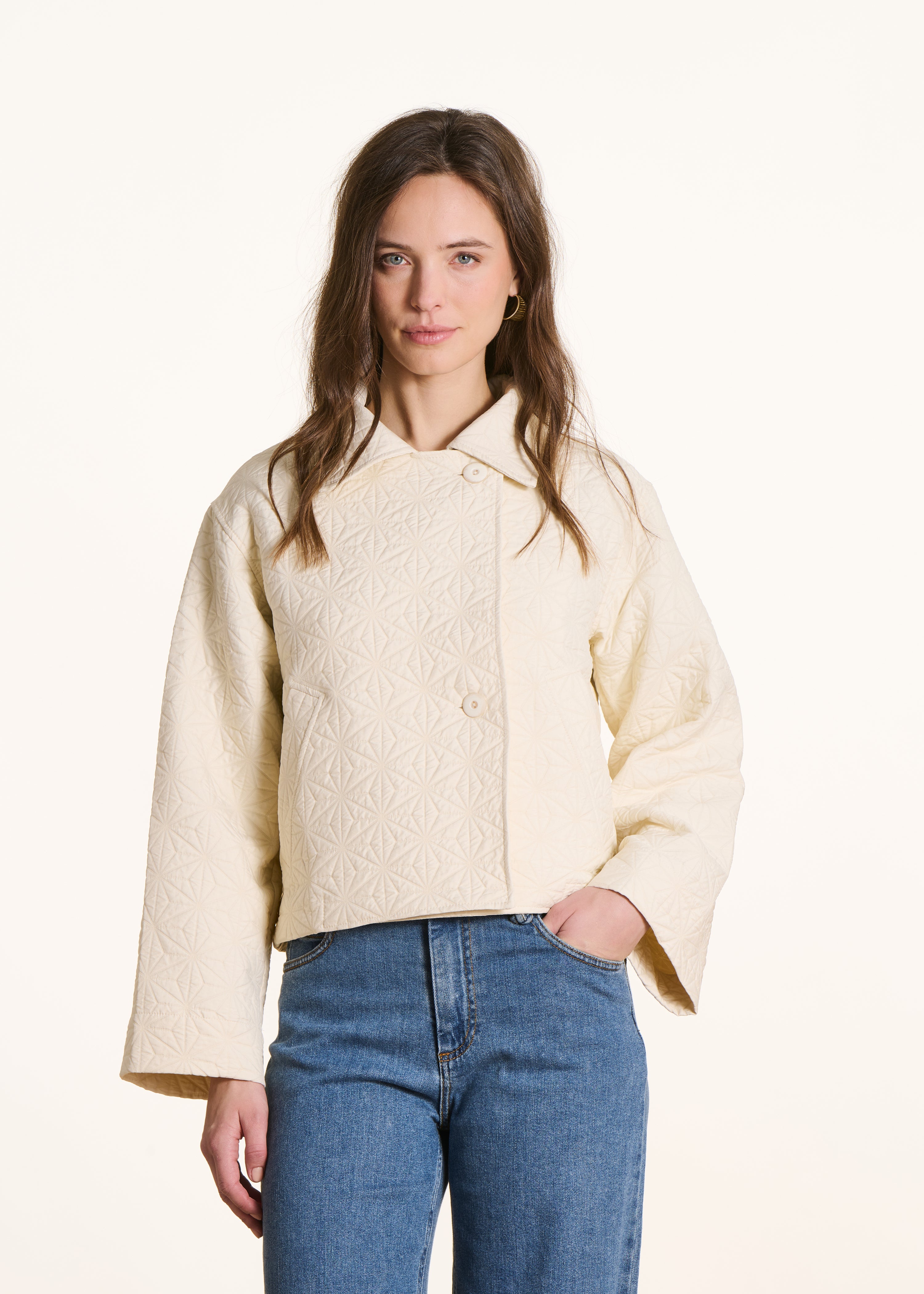 Off-white short jacket in fancy jacquard