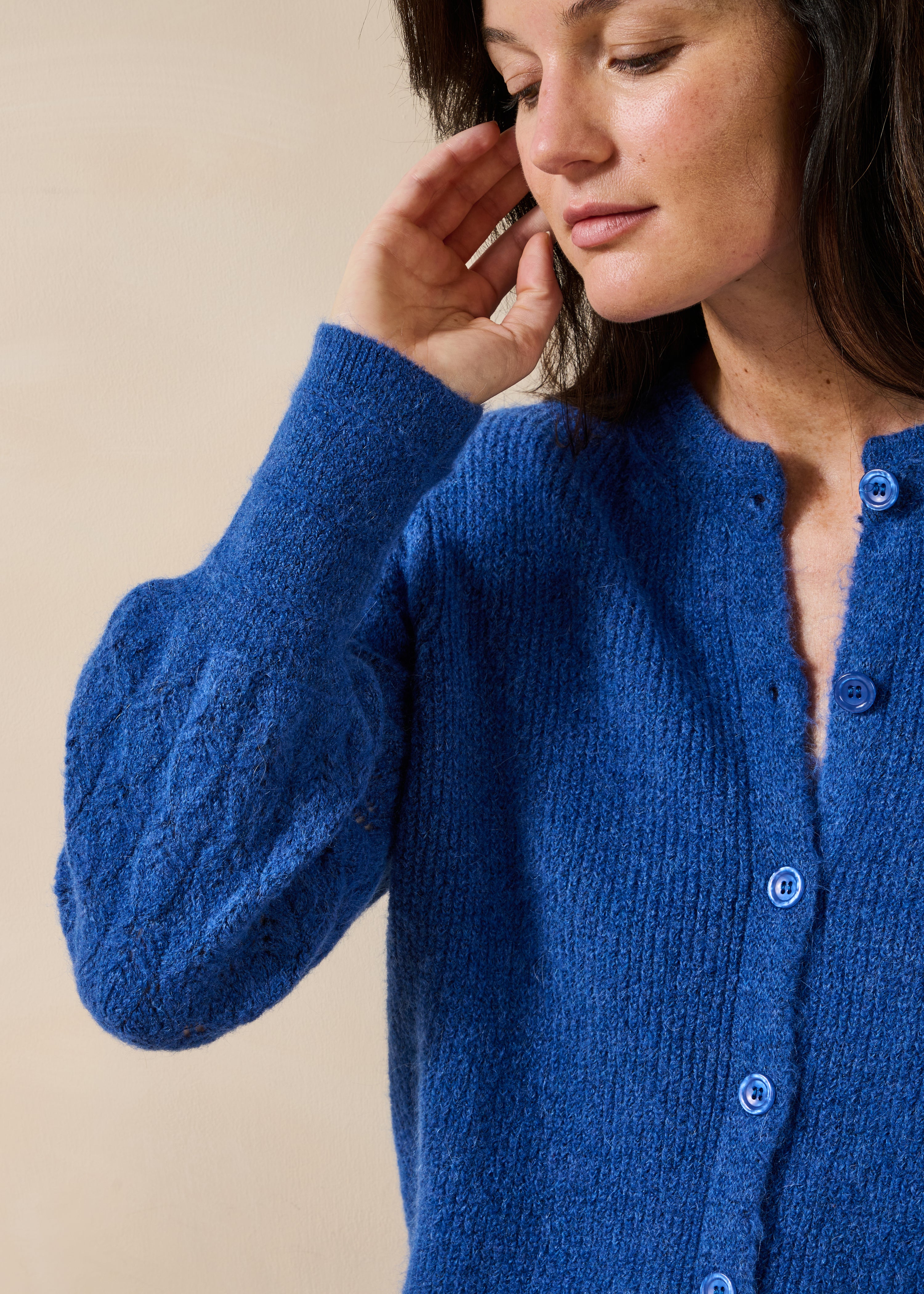 Navy blue long-sleeve cardigan with round neckline