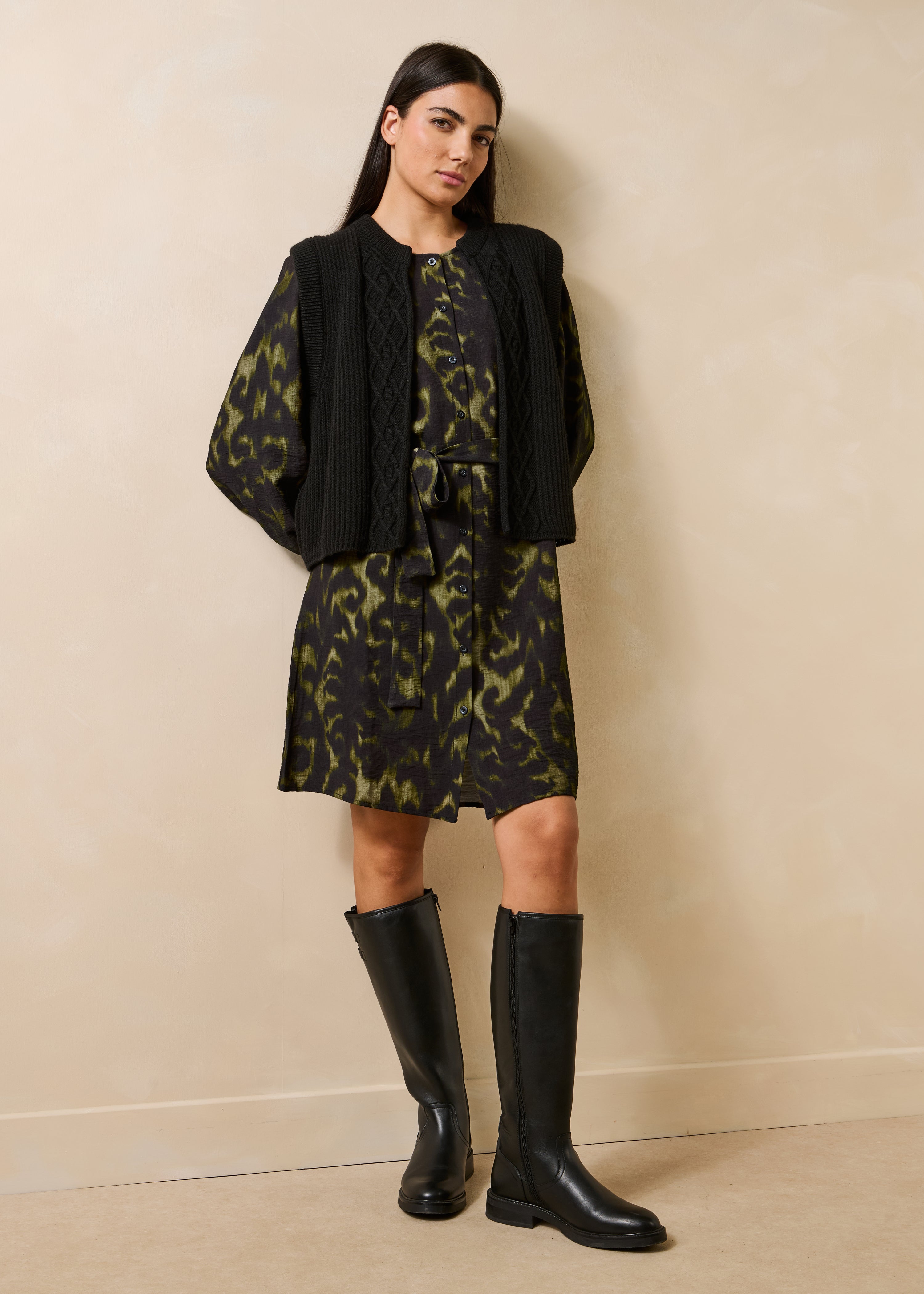 Black sleeveless cardigan with round neckline