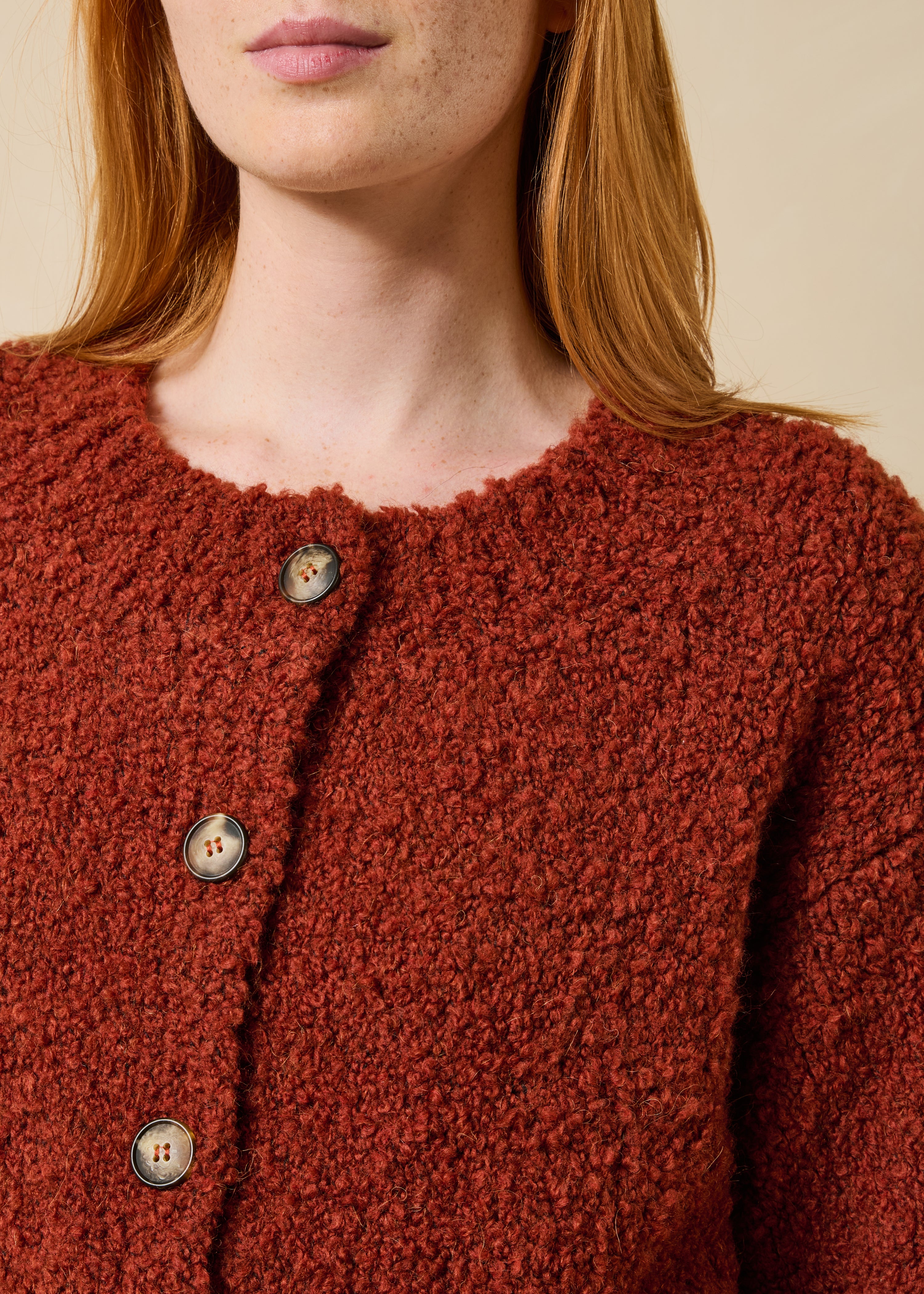 Rust-colored vest