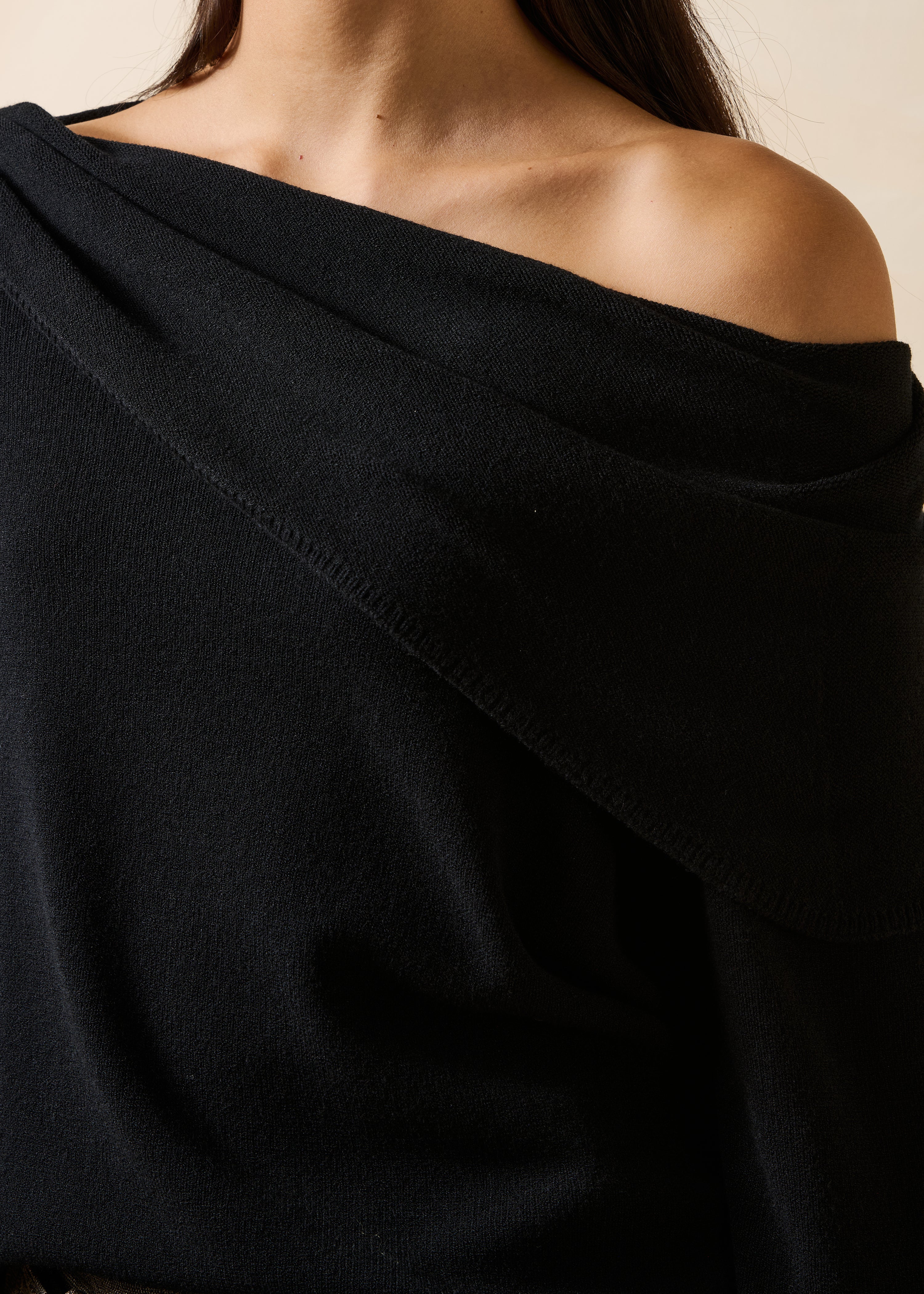 Black long-sleeve draped neckline sweater