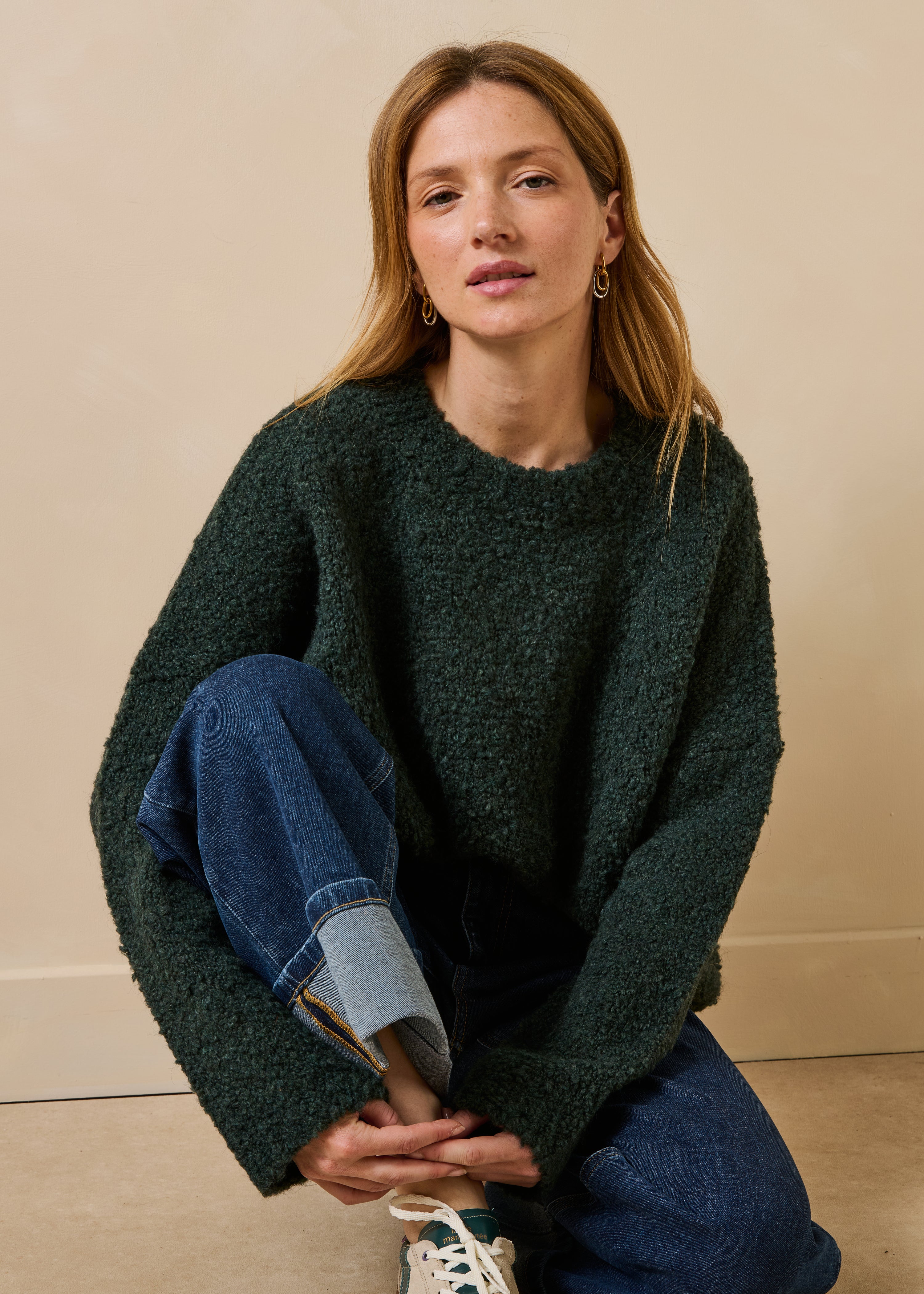 Pull groen flesje boucle met lange mouwen en ronde hals