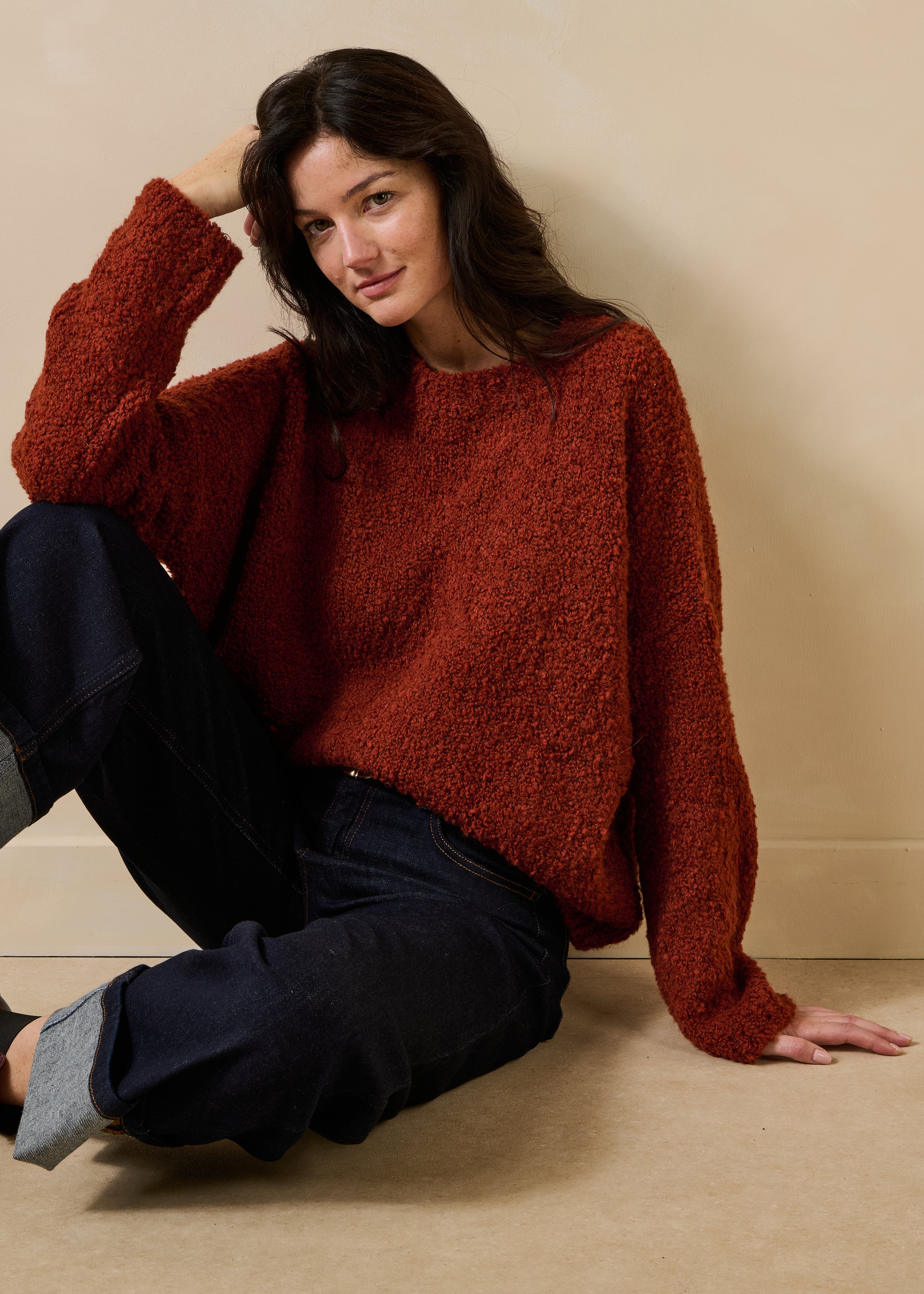 Rust boucle knit long sleeve round neck sweater